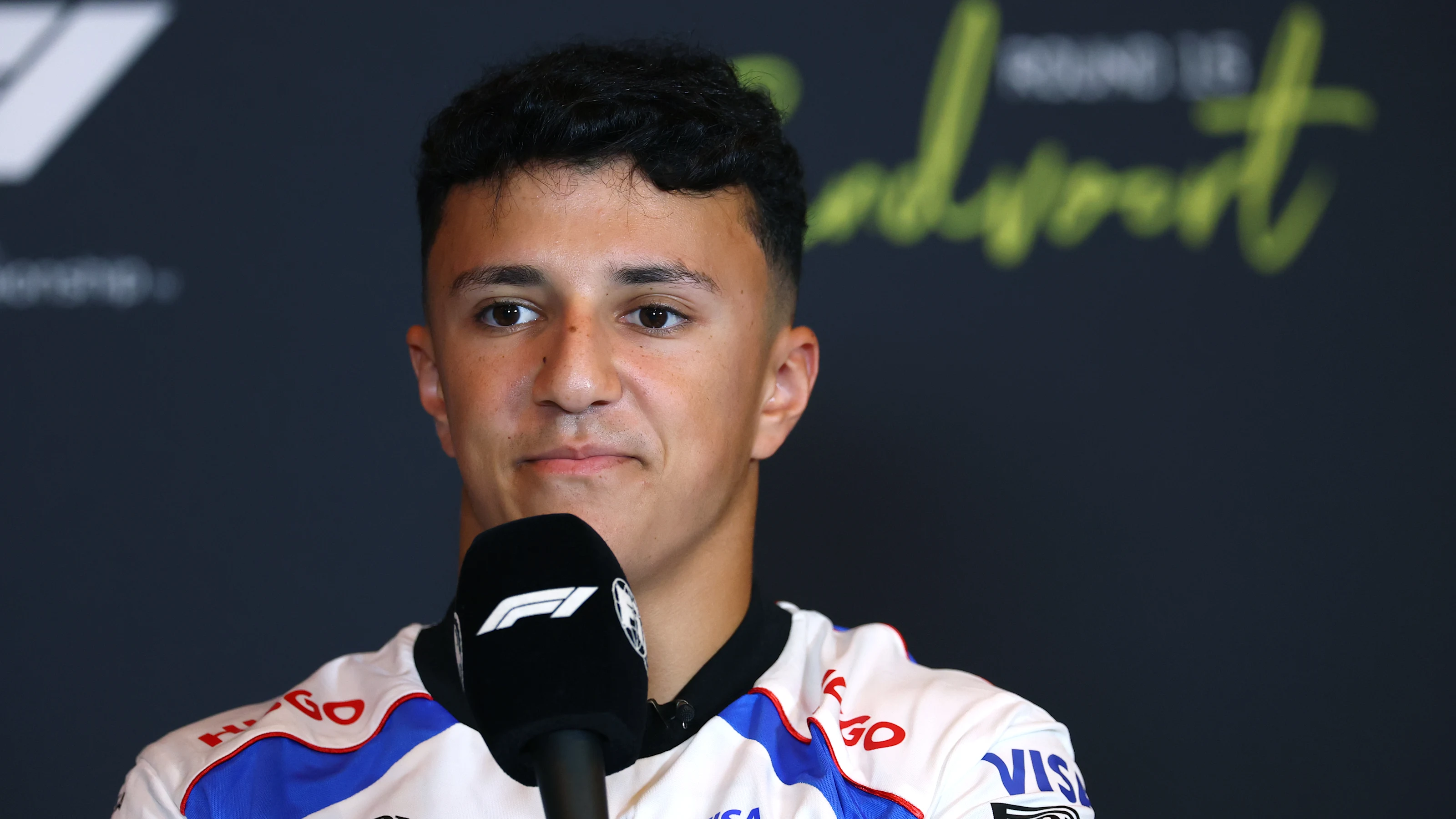 ZANDVOORT, NETHERLANDS - AUGUST 28: Isack Hadjar of France and Visa Cash App Racing Bulls speaks in