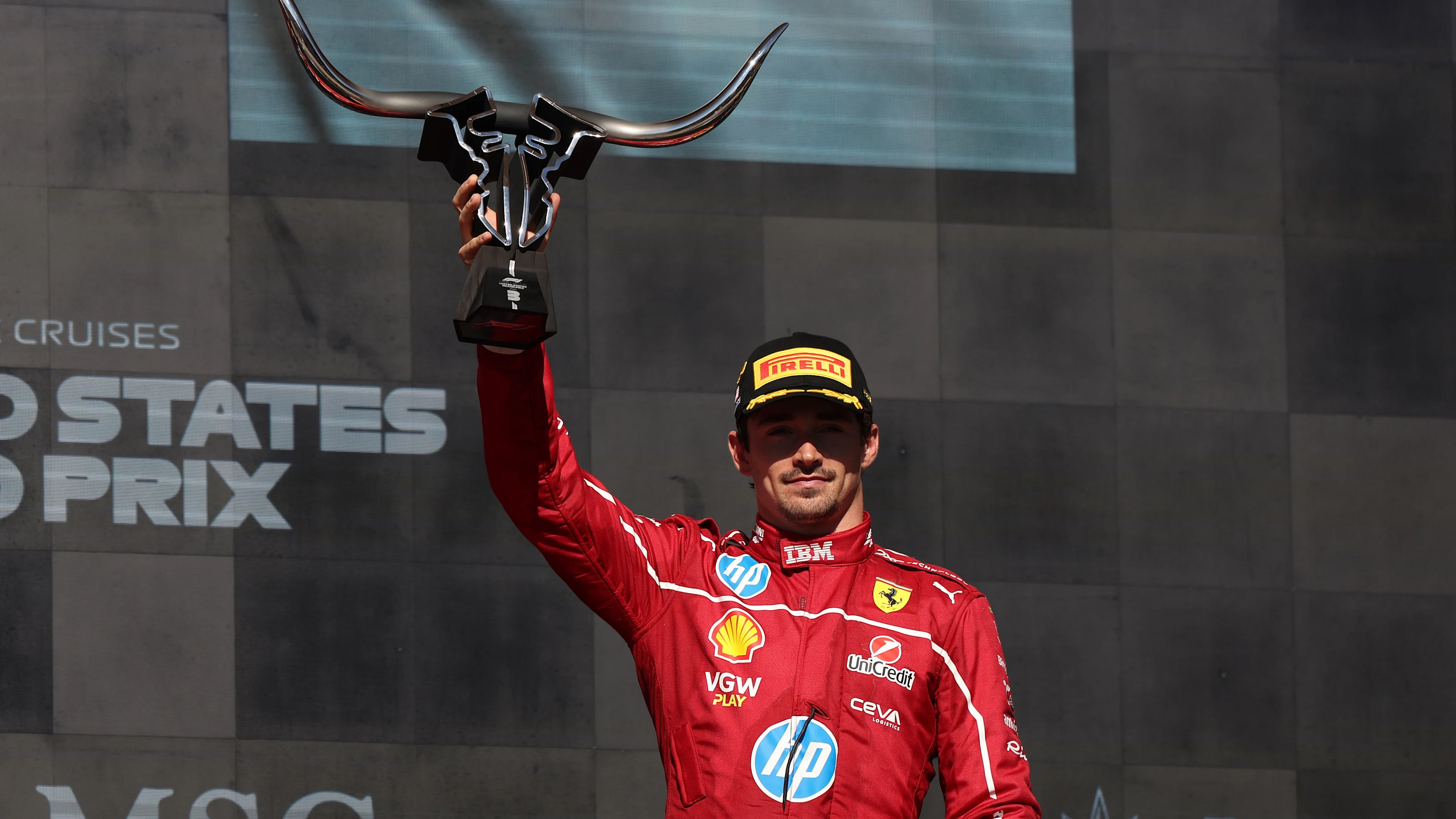 AUSTIN, TEXAS - OCTOBER 19: Third placed Charles Leclerc of Monaco and Scuderia Ferrari lifts his