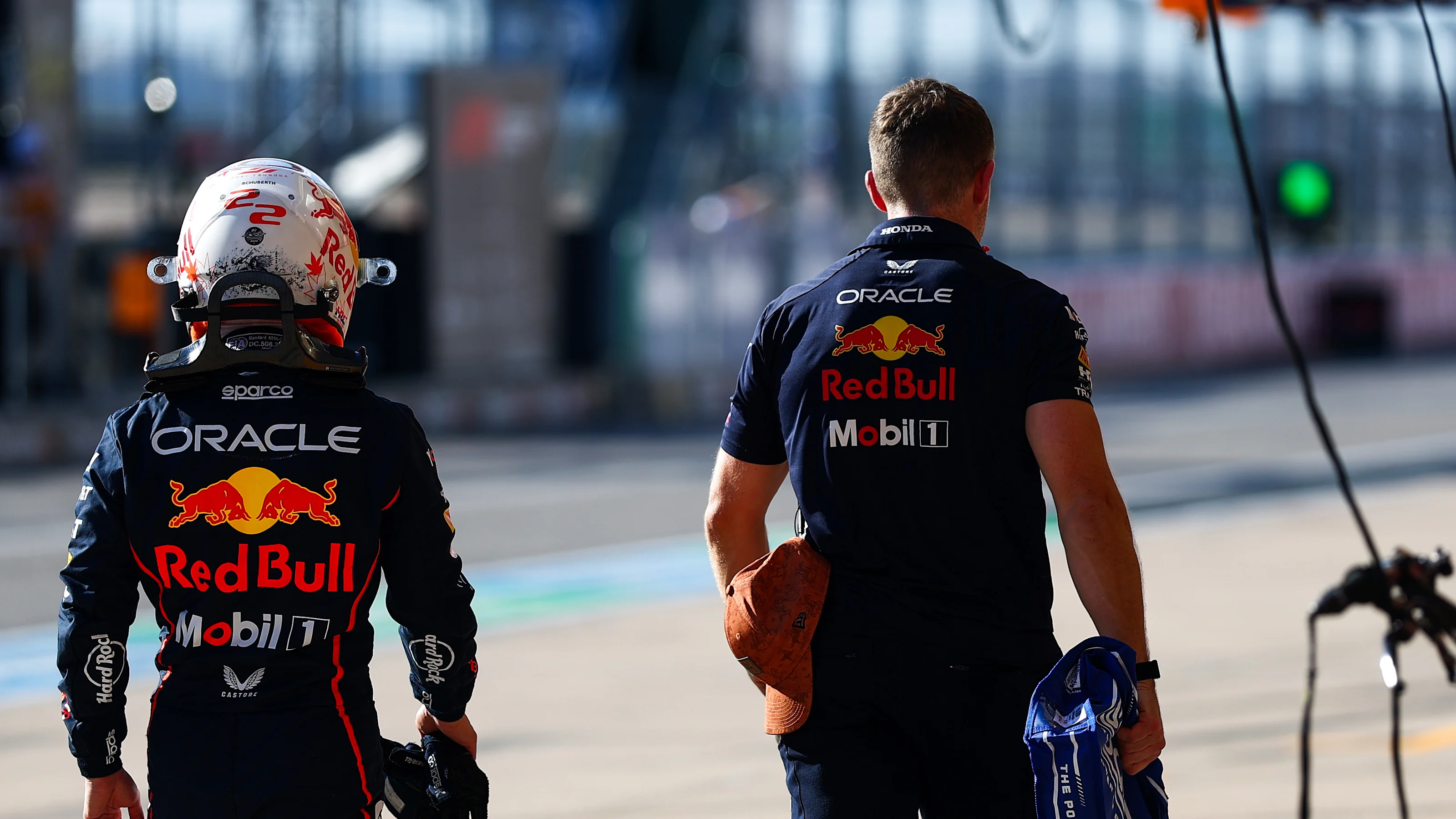 AUSTIN, TEXAS - OCTOBER 17: Yuki Tsunoda of Japan and Oracle Red Bull Racing walks in the Pitlane