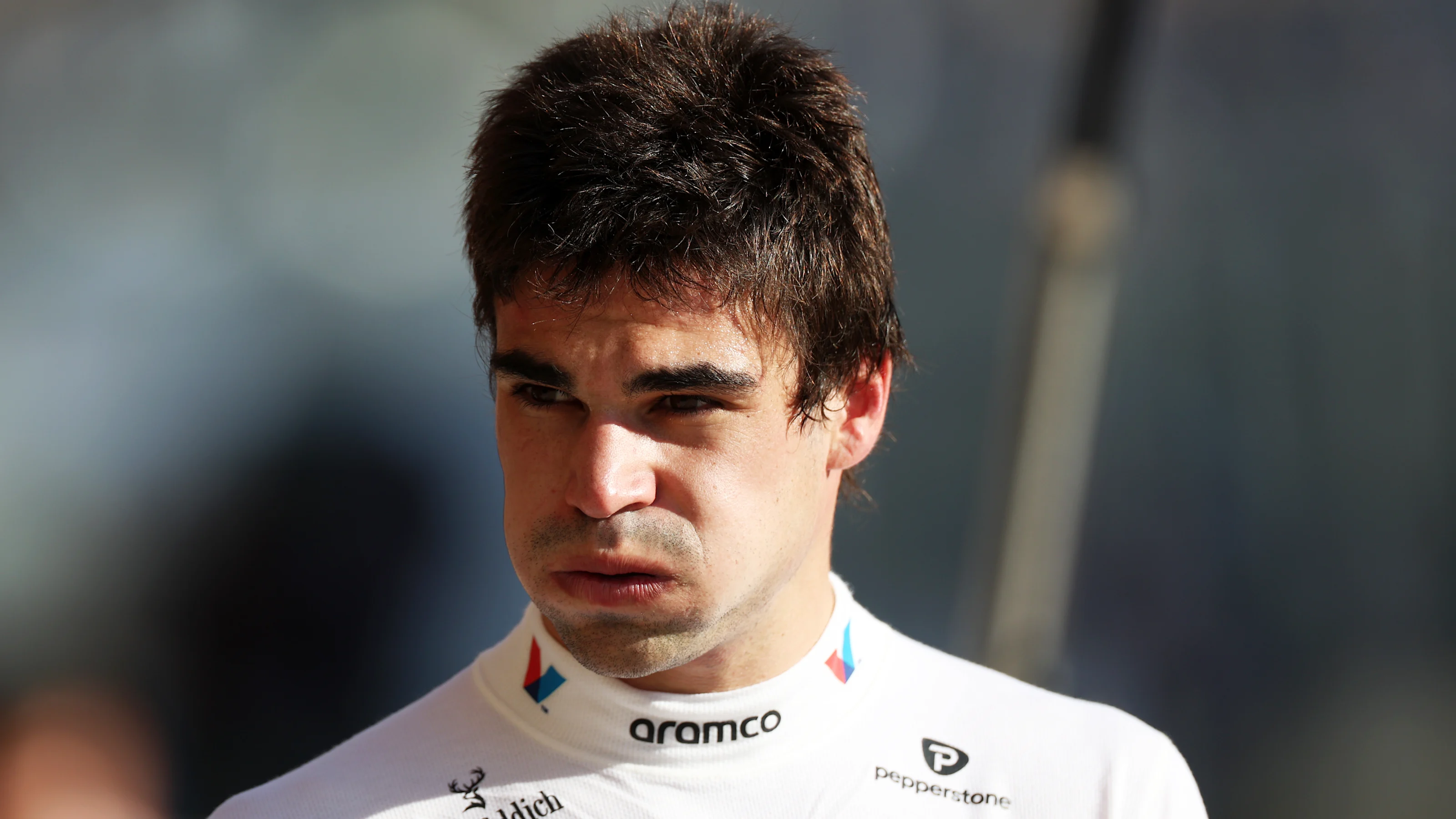 AUSTIN, TEXAS - OCTOBER 17: Lance Stroll of Canada and Aston Martin F1 Team looks on during Sprint