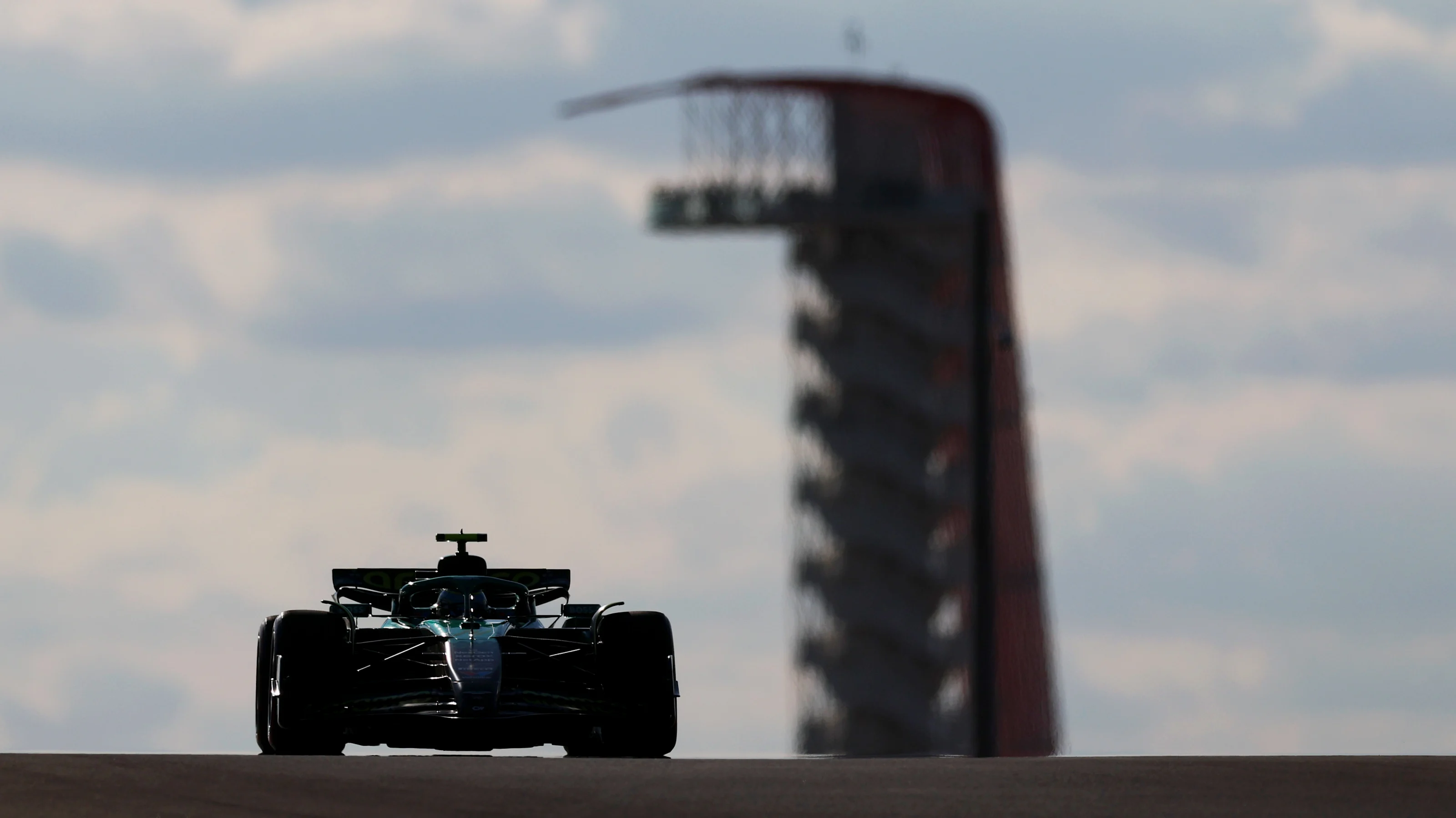 AUSTIN, TEXAS - OCTOBER 18: Fernando Alonso of Spain driving the (14) Aston Martin F1 Team AMR25