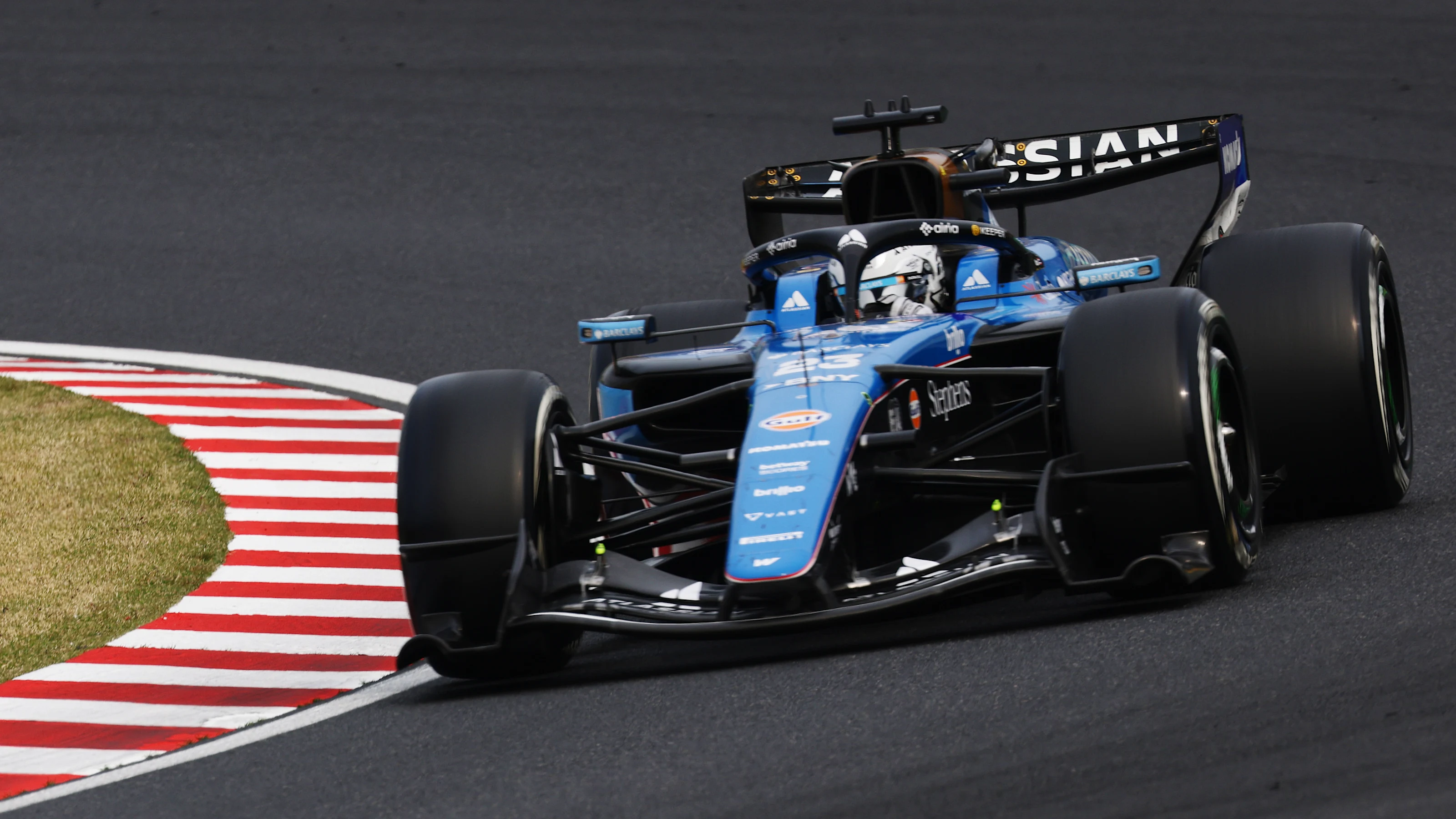 SUZUKA, JAPAN - MARCH 29: Alexander Albon of Thailand driving the (23) Williams FW48 Mercedes on