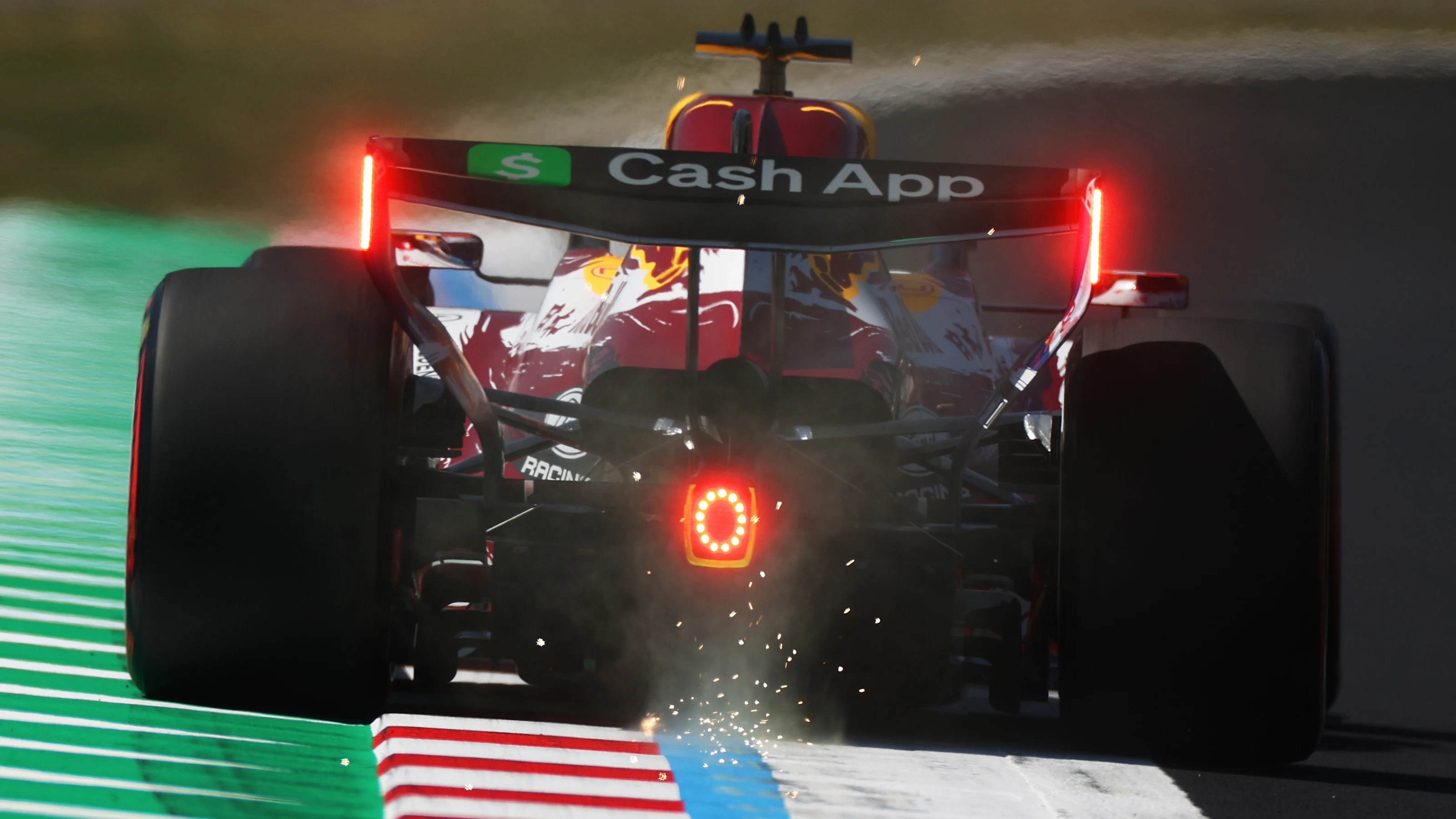 SUZUKA, JAPAN - MARCH 27: Sparks fly behind Arvid Lindblad of Great Britain driving the (41) Visa