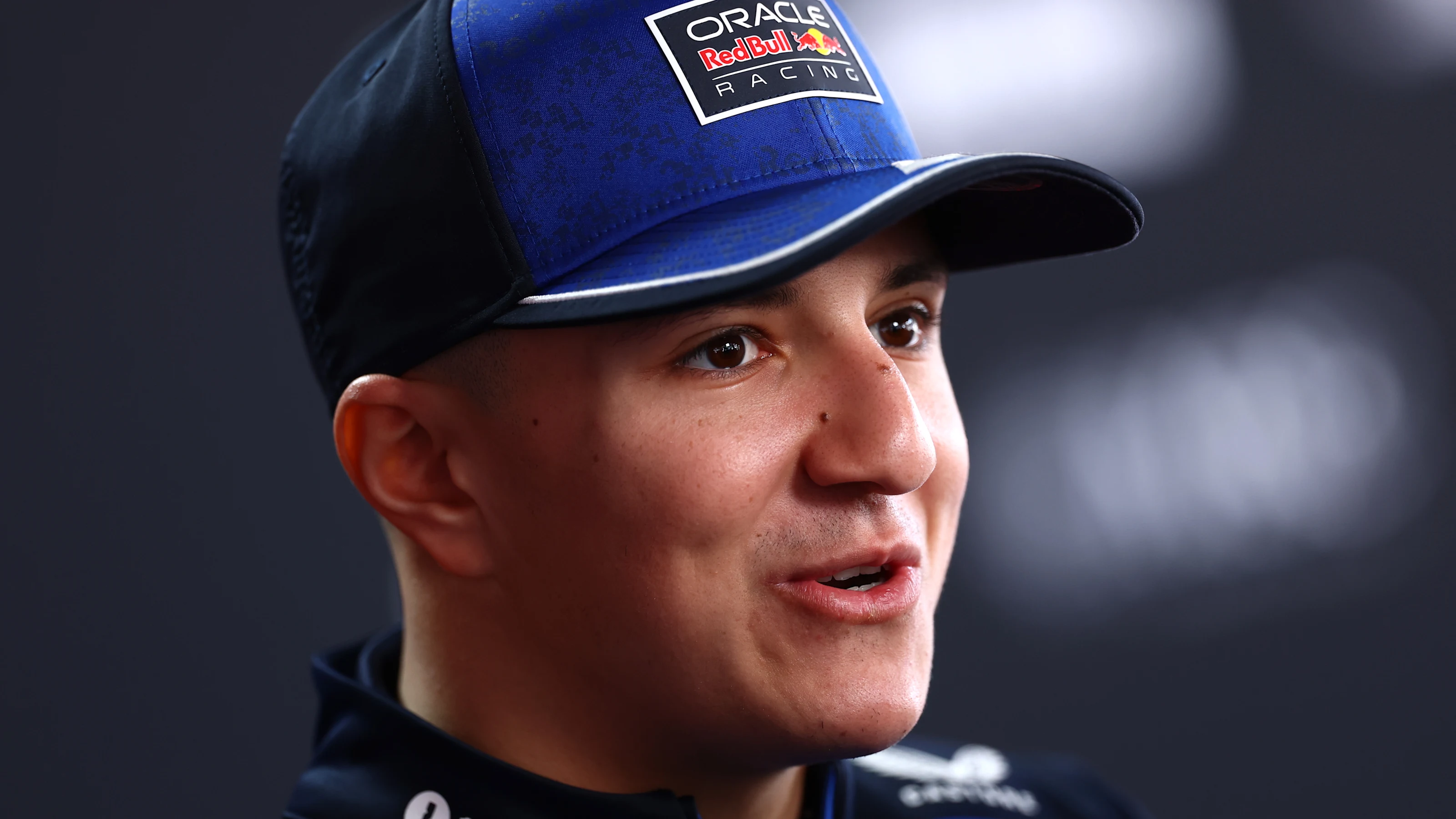 SUZUKA, JAPAN - MARCH 26: Isack Hadjar of France and Oracle Red Bull Racing talks to the media