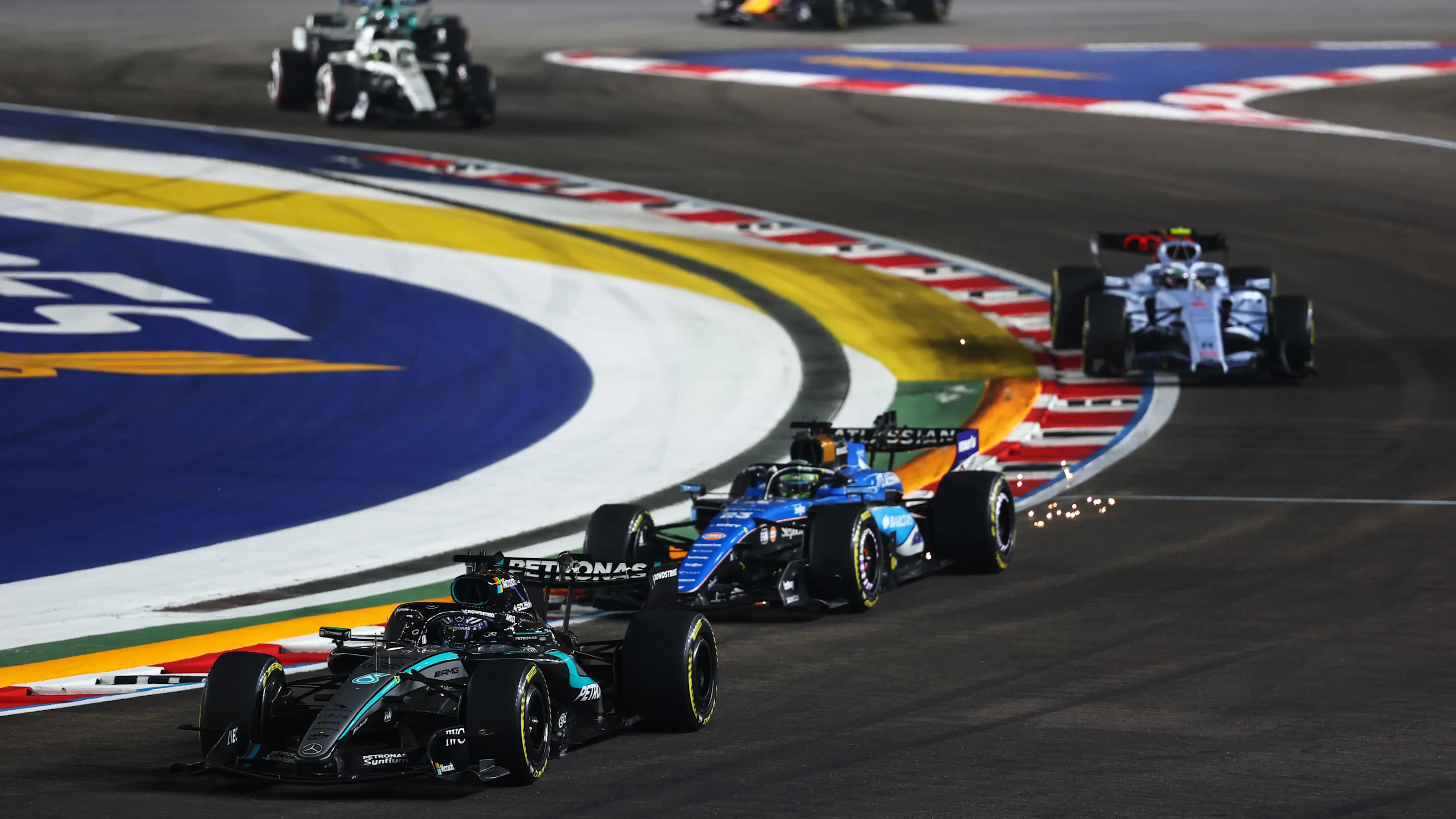 SINGAPORE, SINGAPORE - OCTOBER 11: George Russell of Great Britain driving the (63) Mercedes AMG