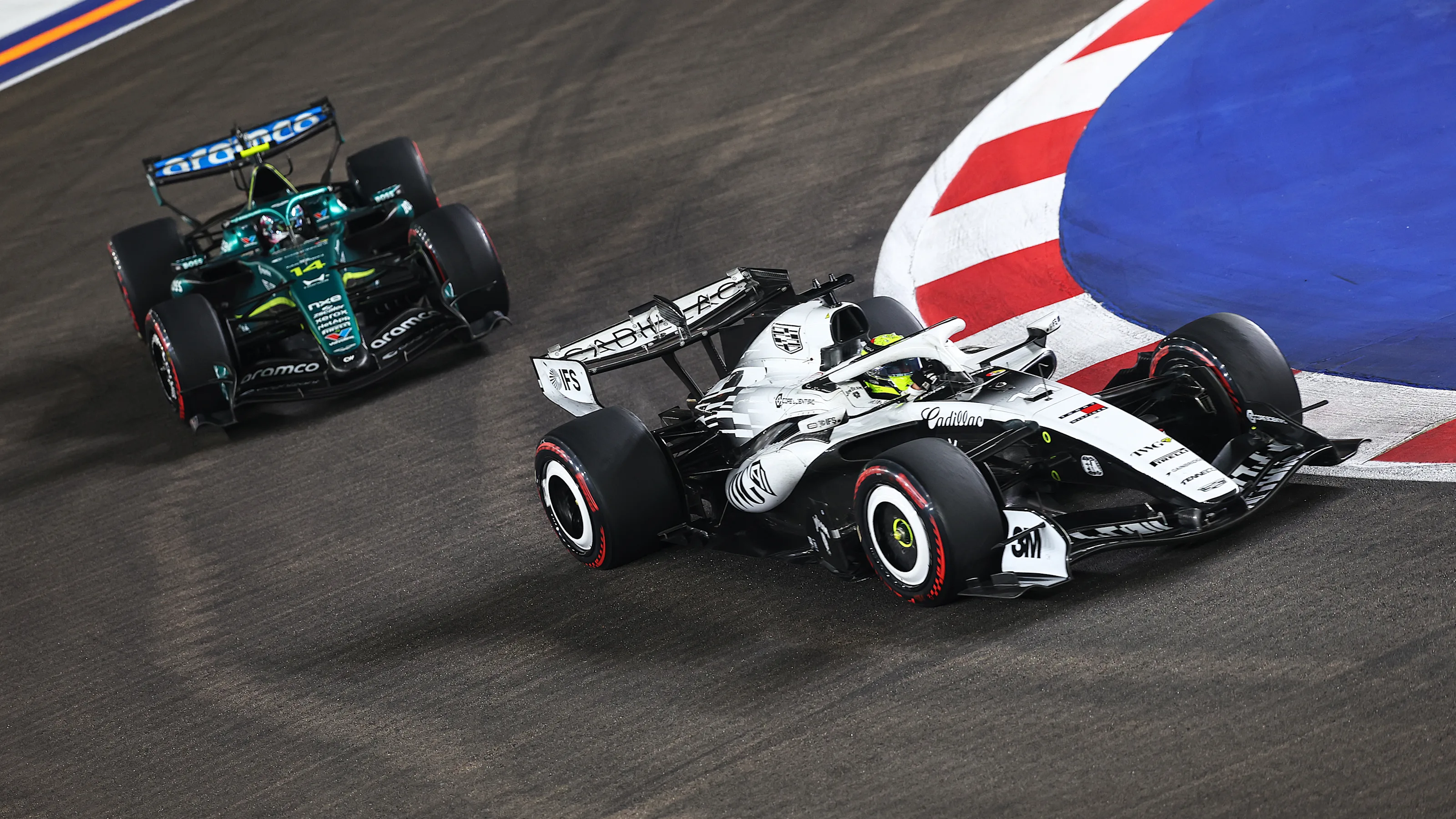 SINGAPORE, SINGAPORE - OCTOBER 11: Sergio Perez of Mexico driving the (11) Cadillac F1 Team MAC-26