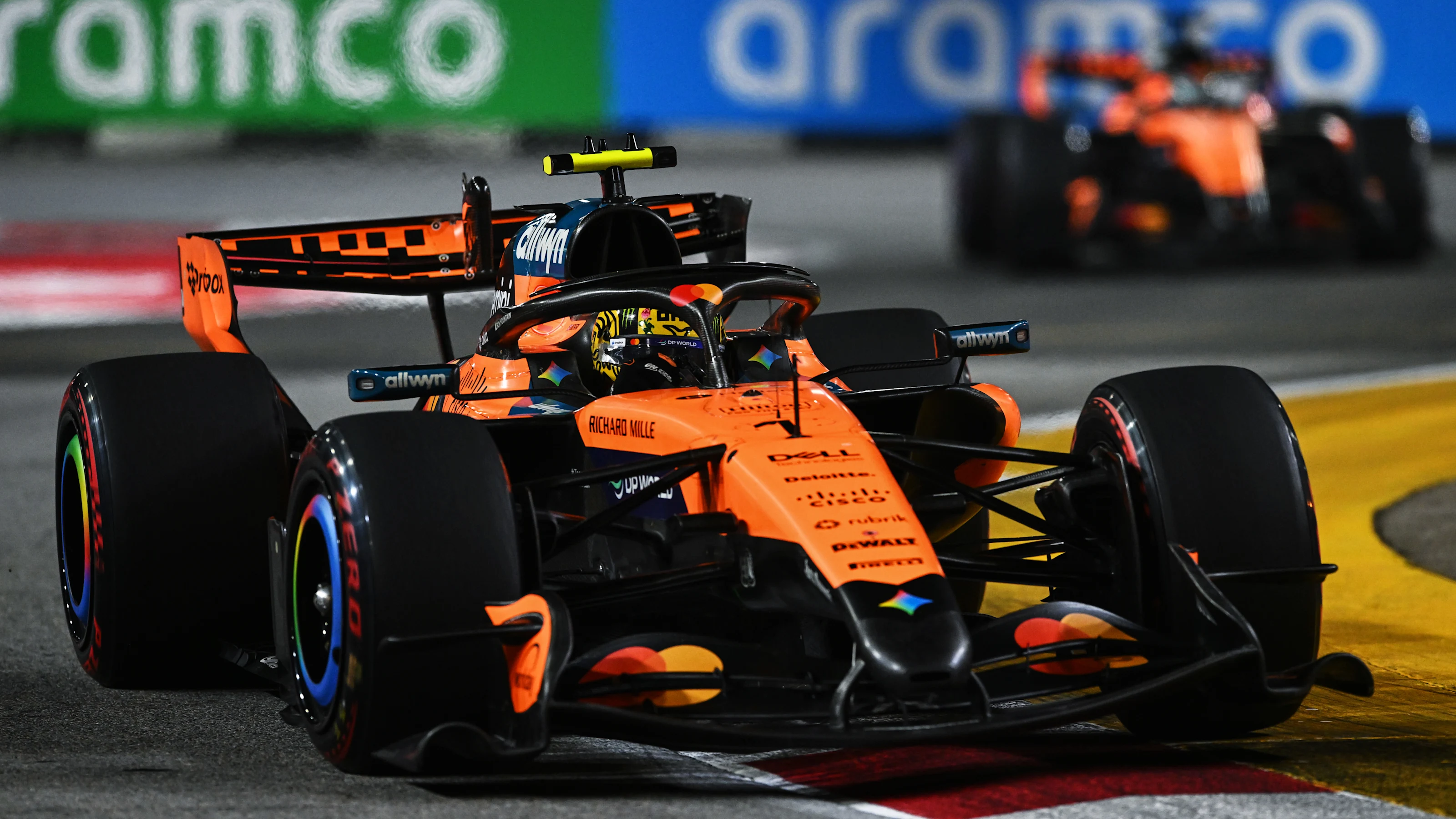 SINGAPORE, SINGAPORE - OCTOBER 11: Lando Norris of Great Britain driving the (1) McLaren MCL40
