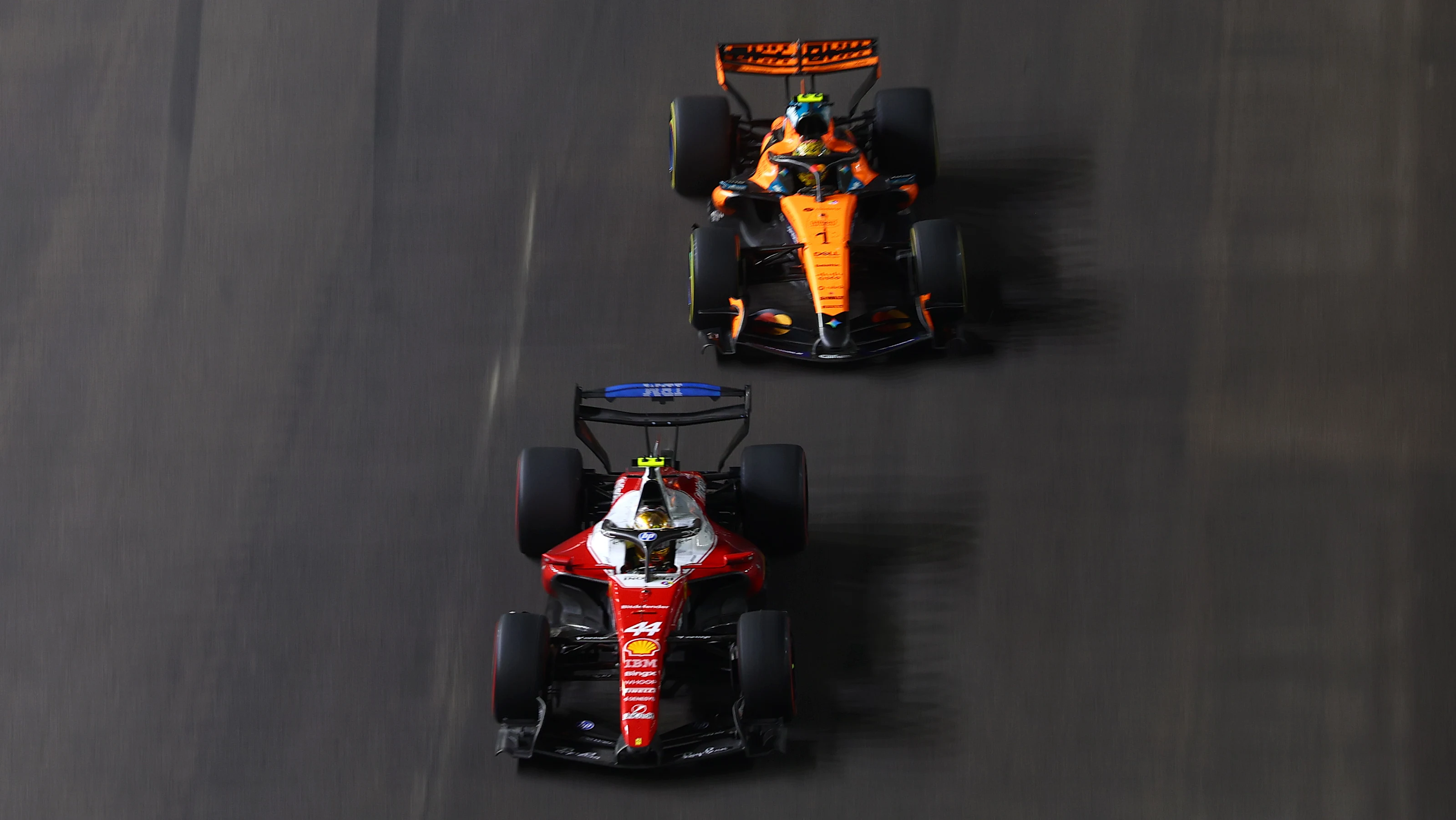 SINGAPORE, SINGAPORE - OCTOBER 11: Lewis Hamilton of Great Britain driving the (44) Scuderia