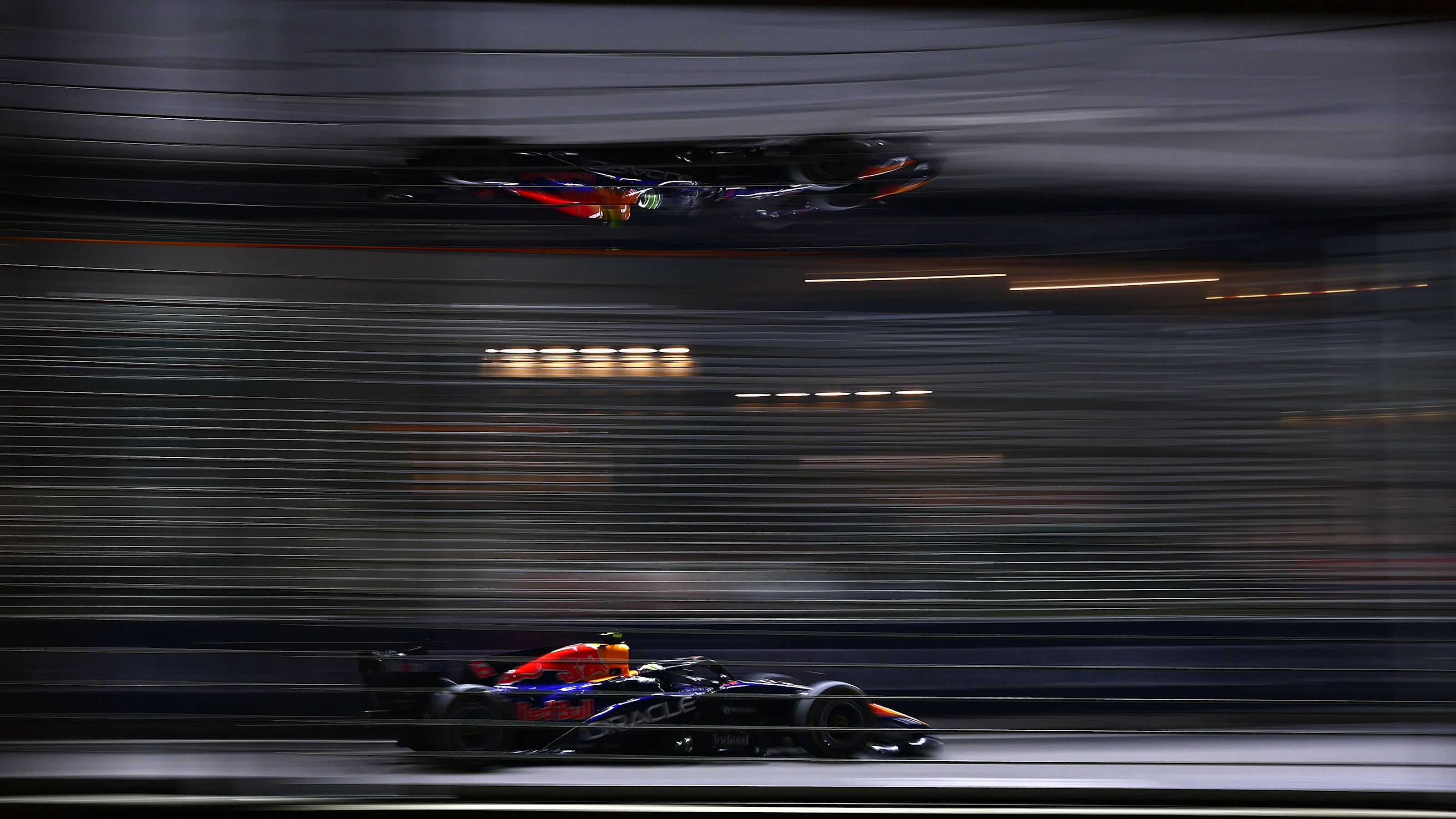 SINGAPORE, SINGAPORE - OCTOBER 11: Isack Hadjar of France driving the (6) Oracle Red Bull Racing