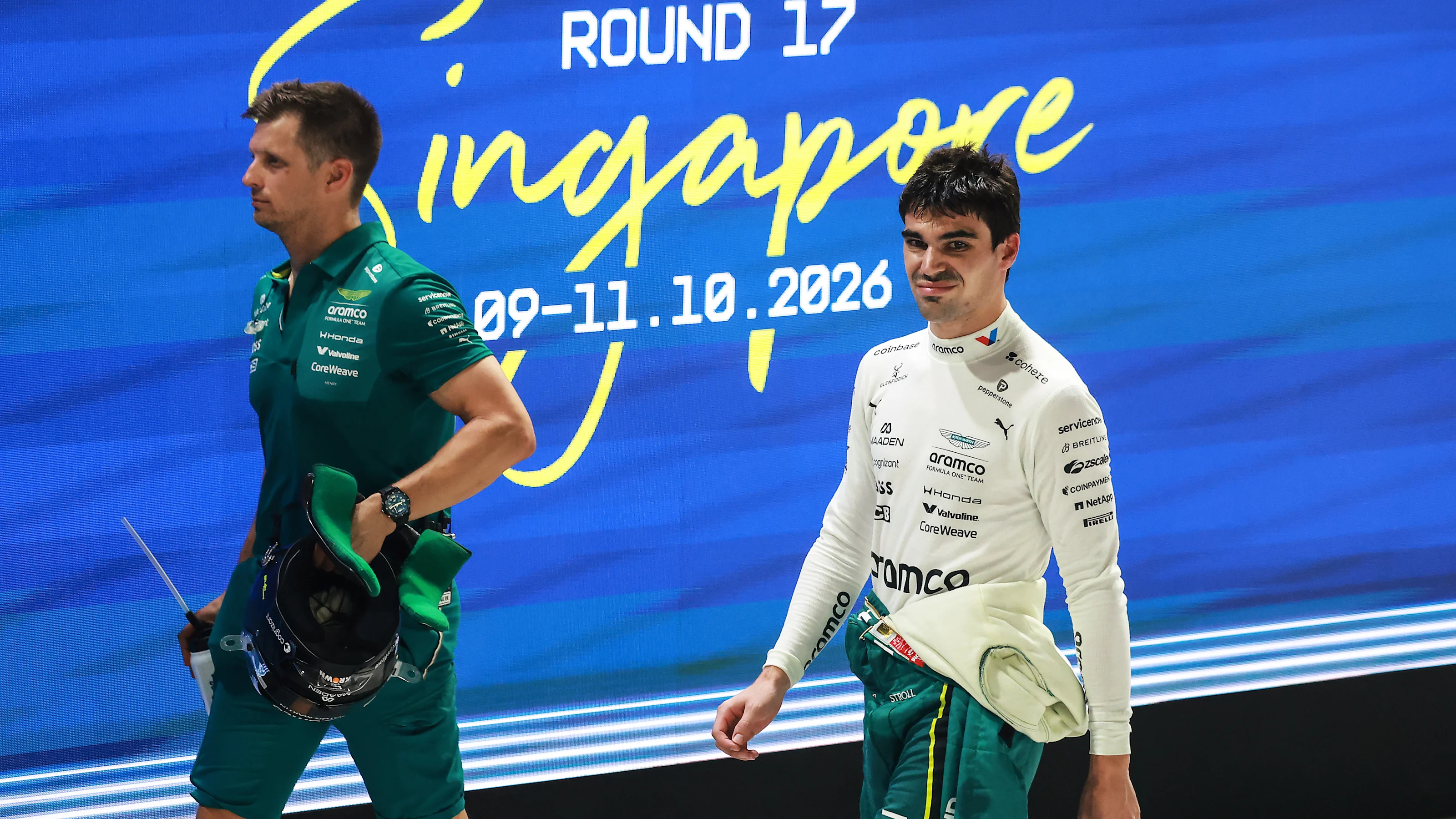 SINGAPORE, SINGAPORE - OCTOBER 09: Eighteenth placed qualifier Lance Stroll of Canada and Aston