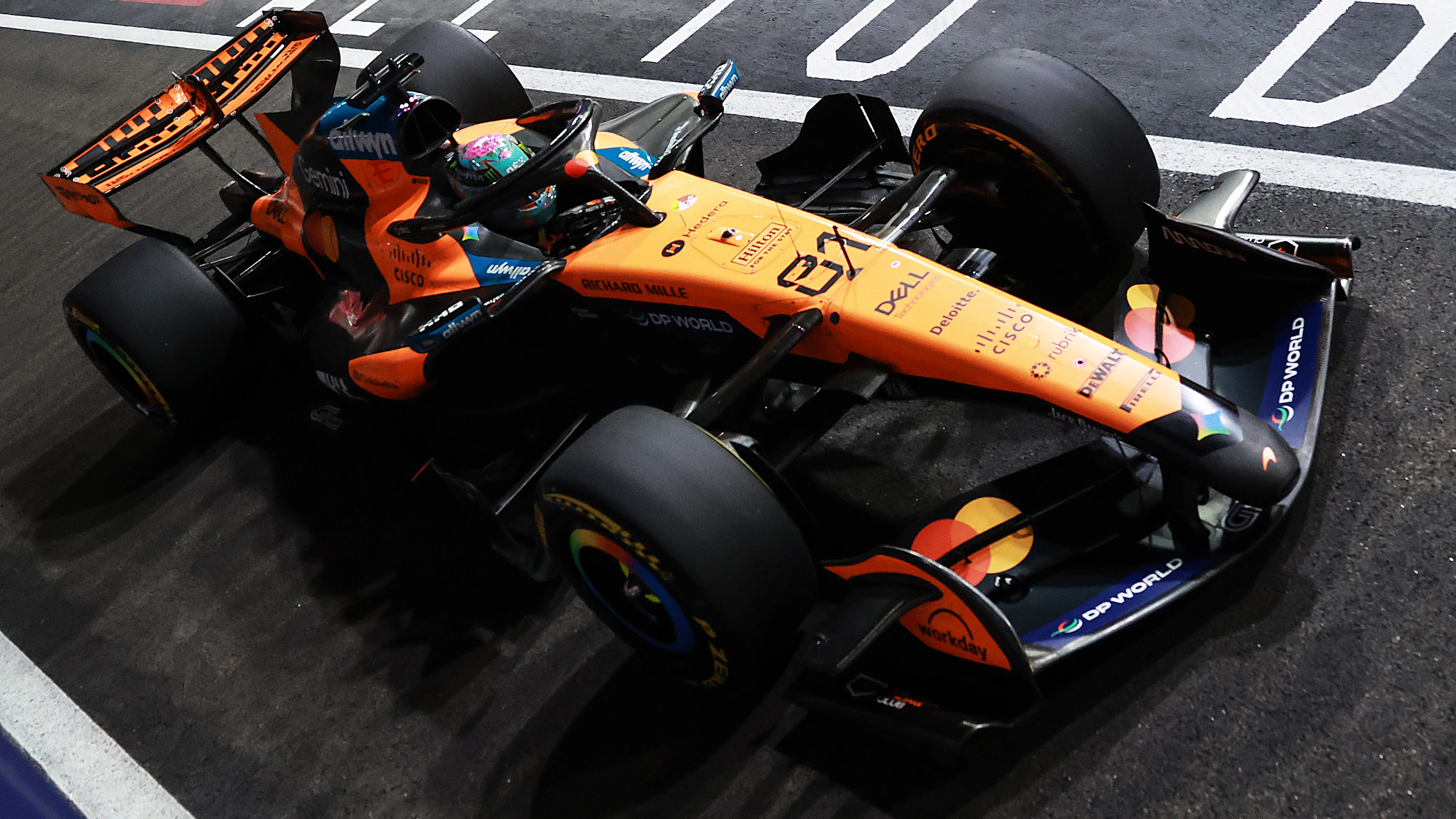 SINGAPORE, SINGAPORE - OCTOBER 09: Oscar Piastri of Australia driving the (81) McLaren MCL40