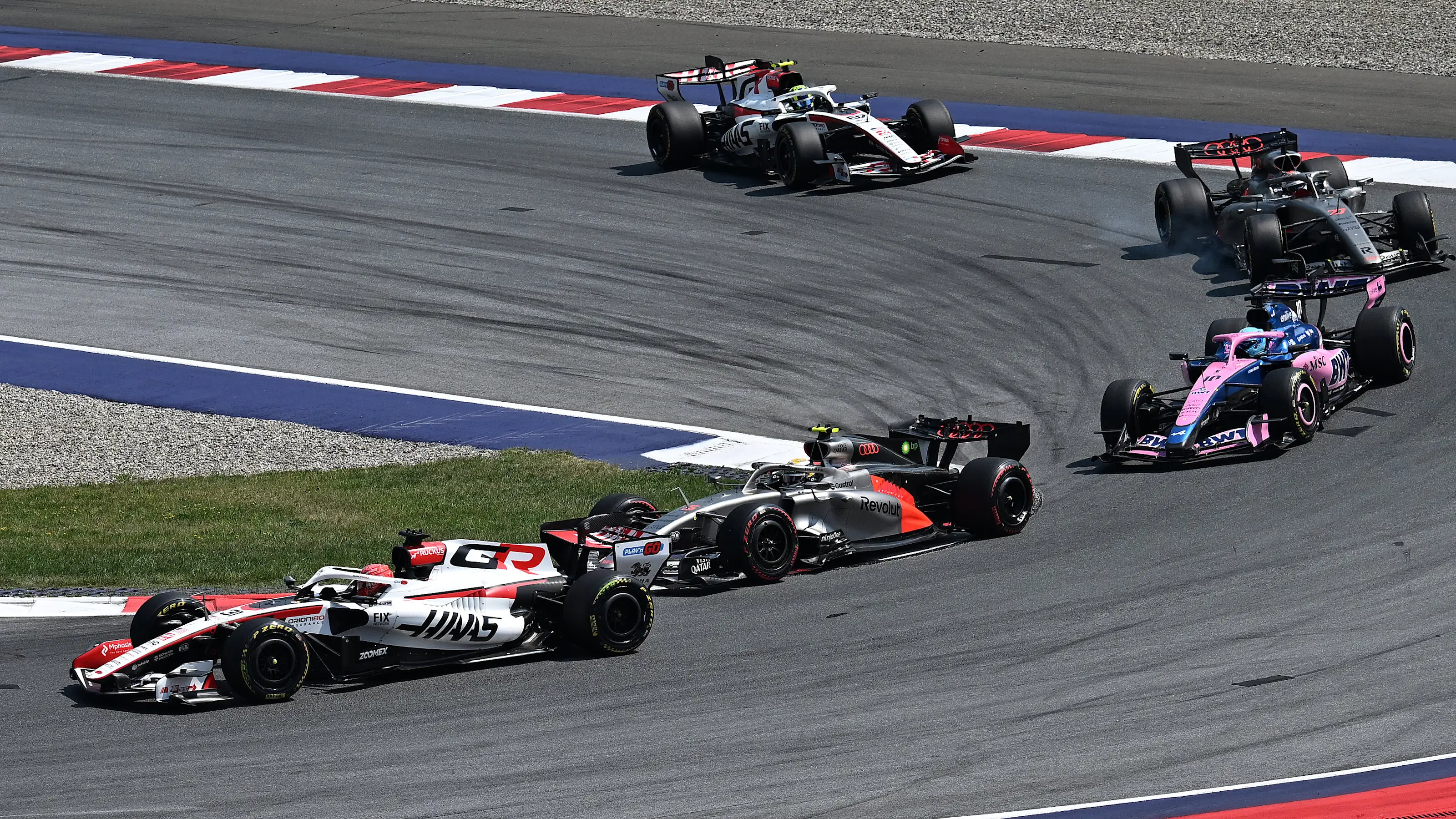 SPIELBERG, AUSTRIA - JUNE 28: Esteban Ocon of France driving the (31) Haas F1 VF-26 Ferrari leads