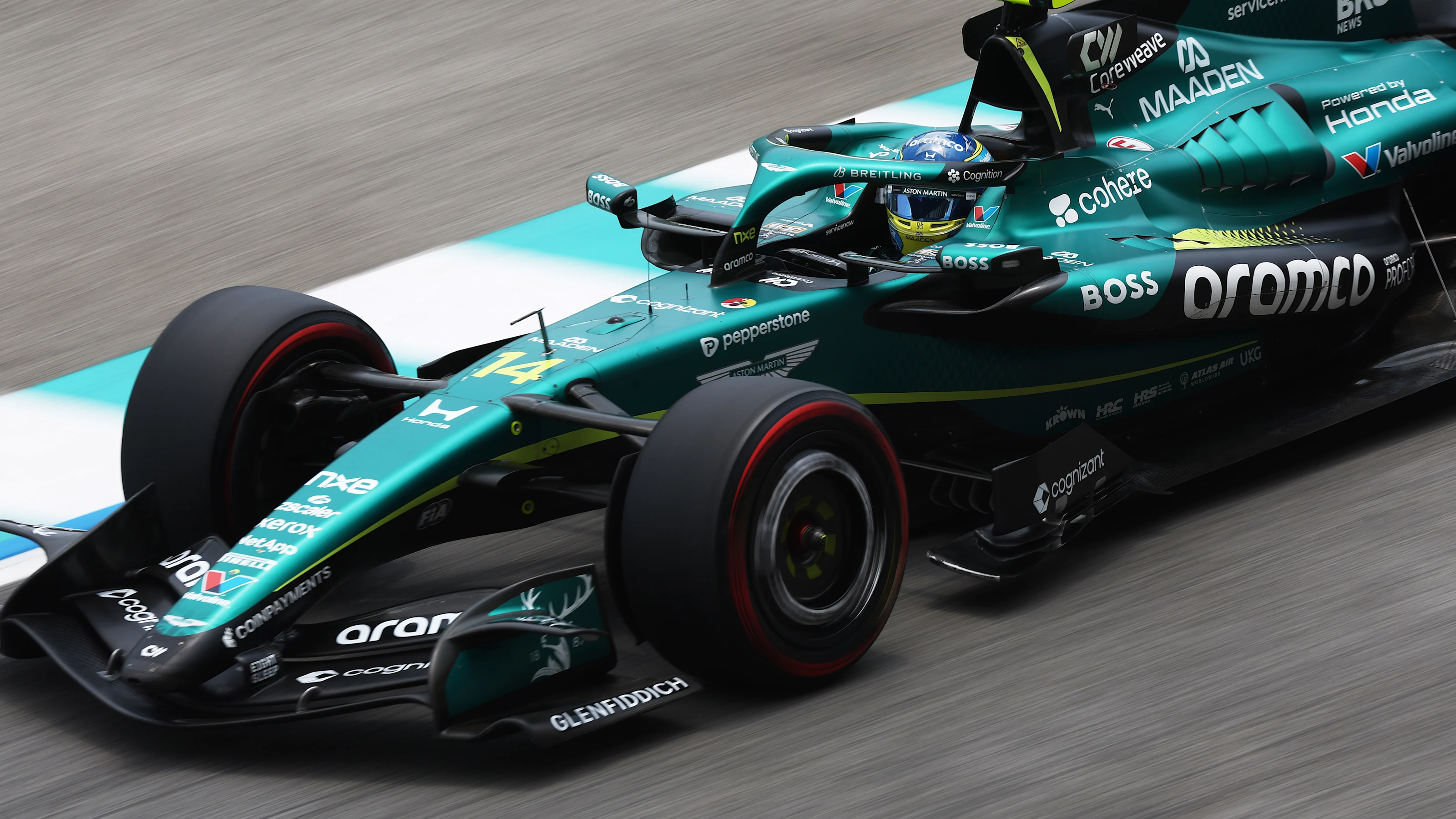KUALA LUMPUR, MALAYSIA - OCTOBER 03: Fernando Alonso of Spain driving the (14) Aston Martin F1 Team