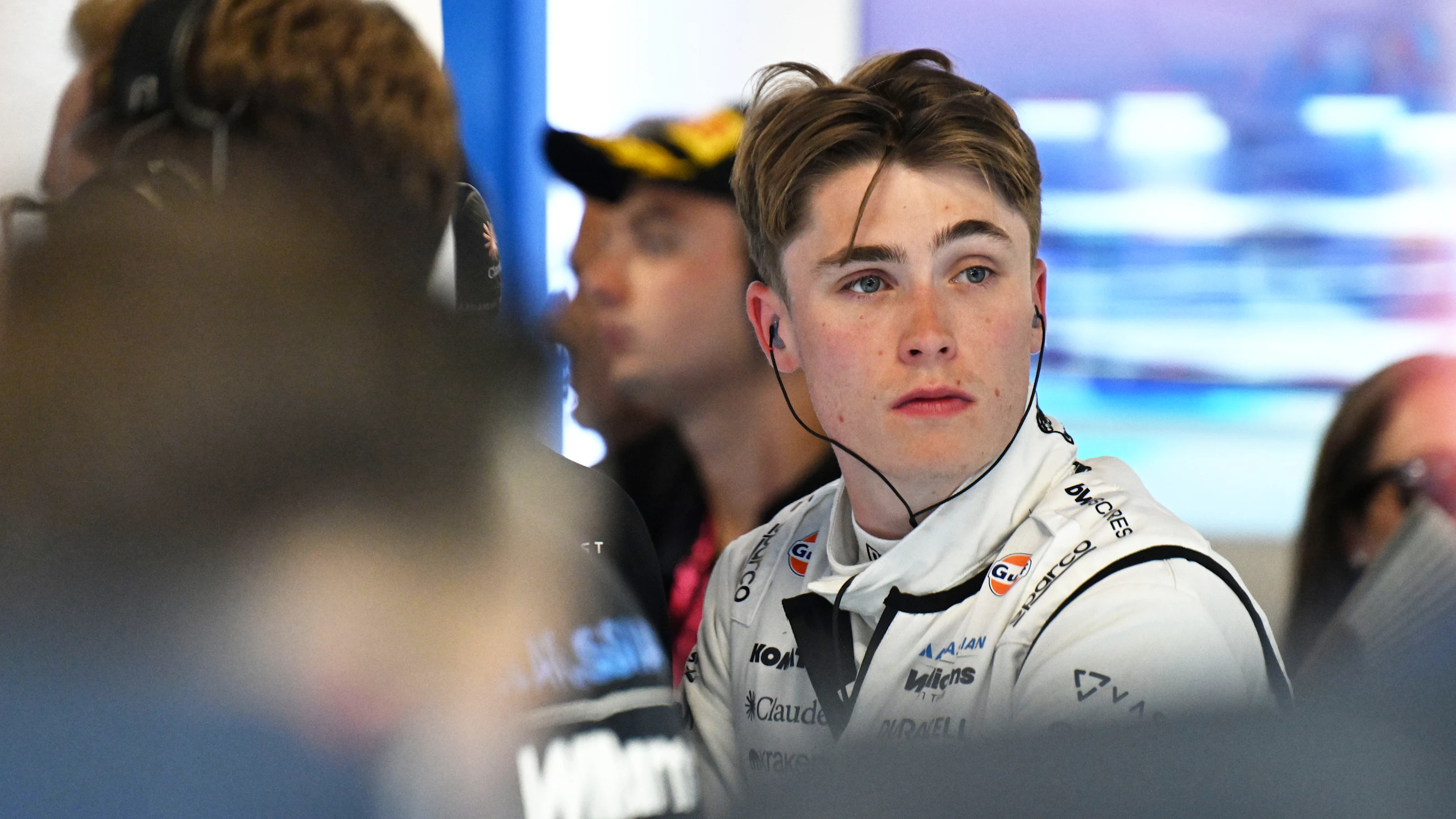 BARCELONA, SPAIN - JUNE 12: Luke Browning of Great Britain and Williams looks on in the garage
