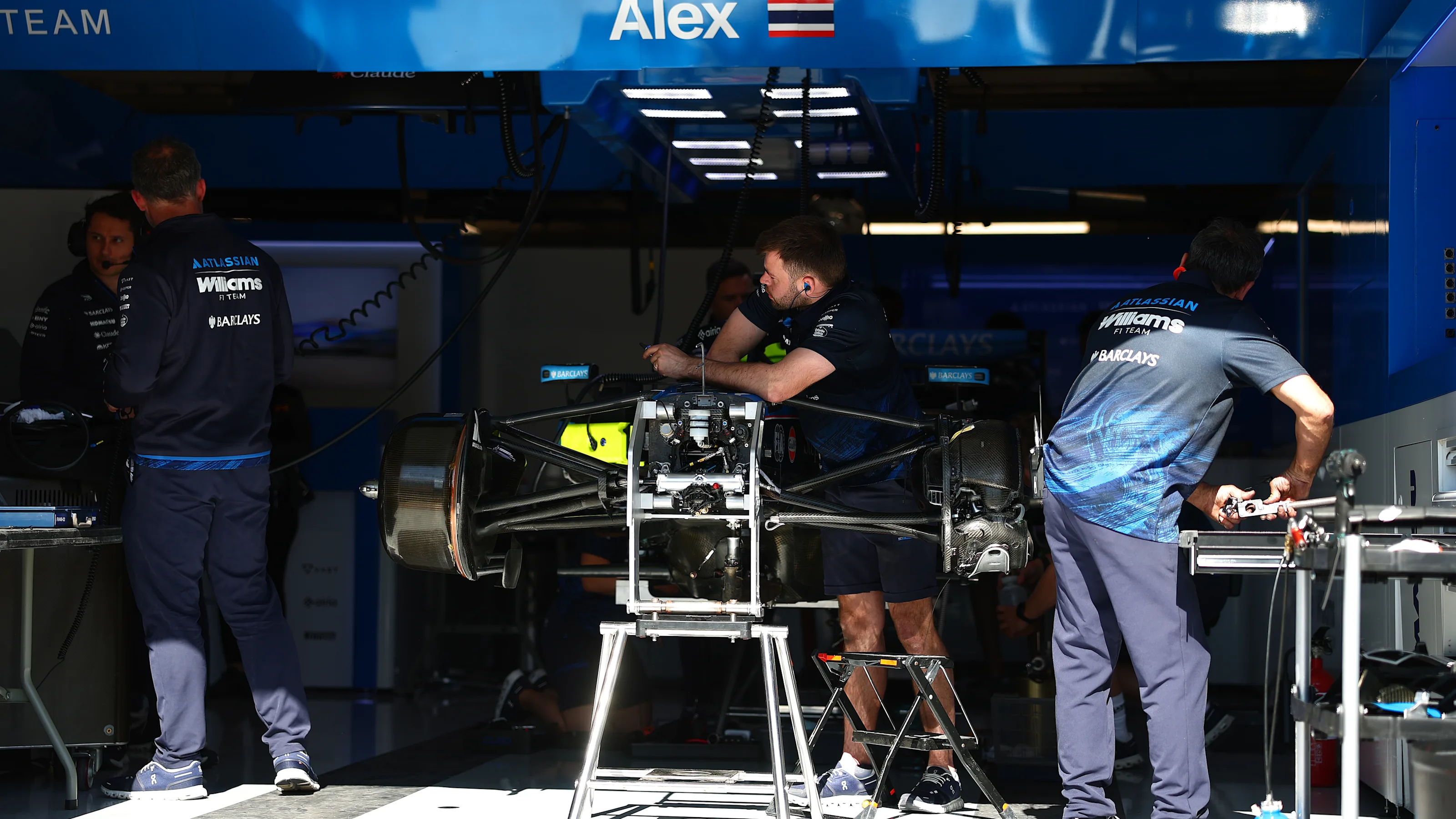 MONTREAL, QUEBEC - MAY 22: Williams team members work on the car of Alexander Albon of Thailand and