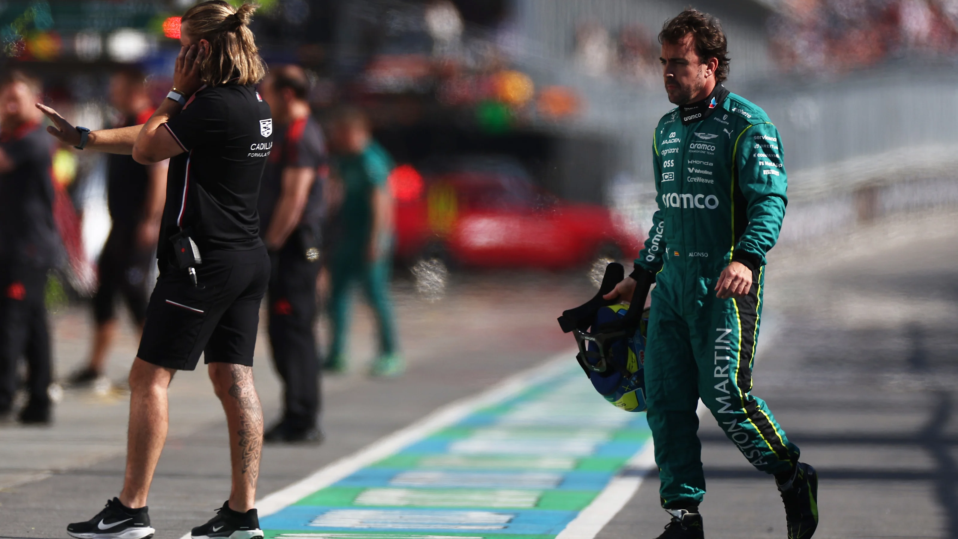 MONTREAL, QUEBEC - MAY 22: Fernando Alonso of Spain and Aston Martin F1 Team walks in the Pitlane