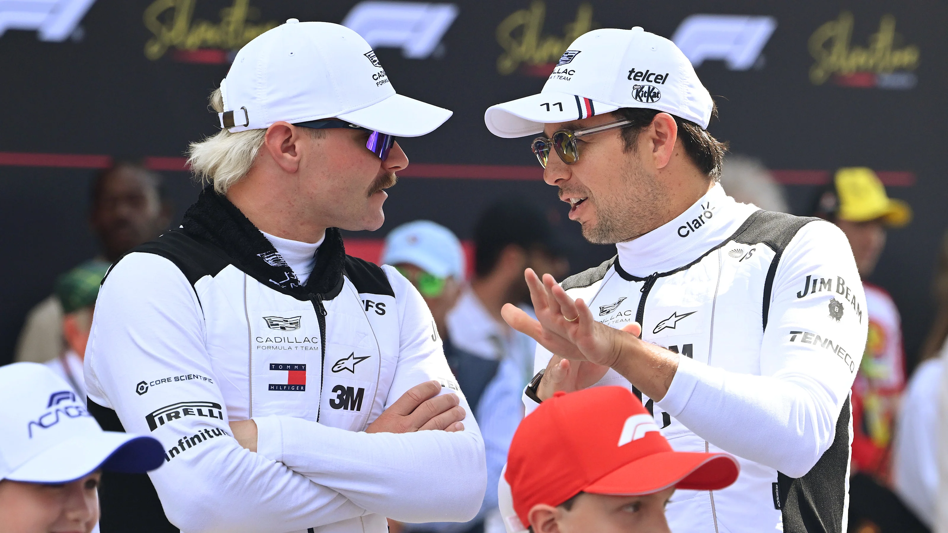 NORTHAMPTON, ENGLAND - JULY 05: Valtteri Bottas of Finland and Cadillac F1 Team and Sergio Perez of