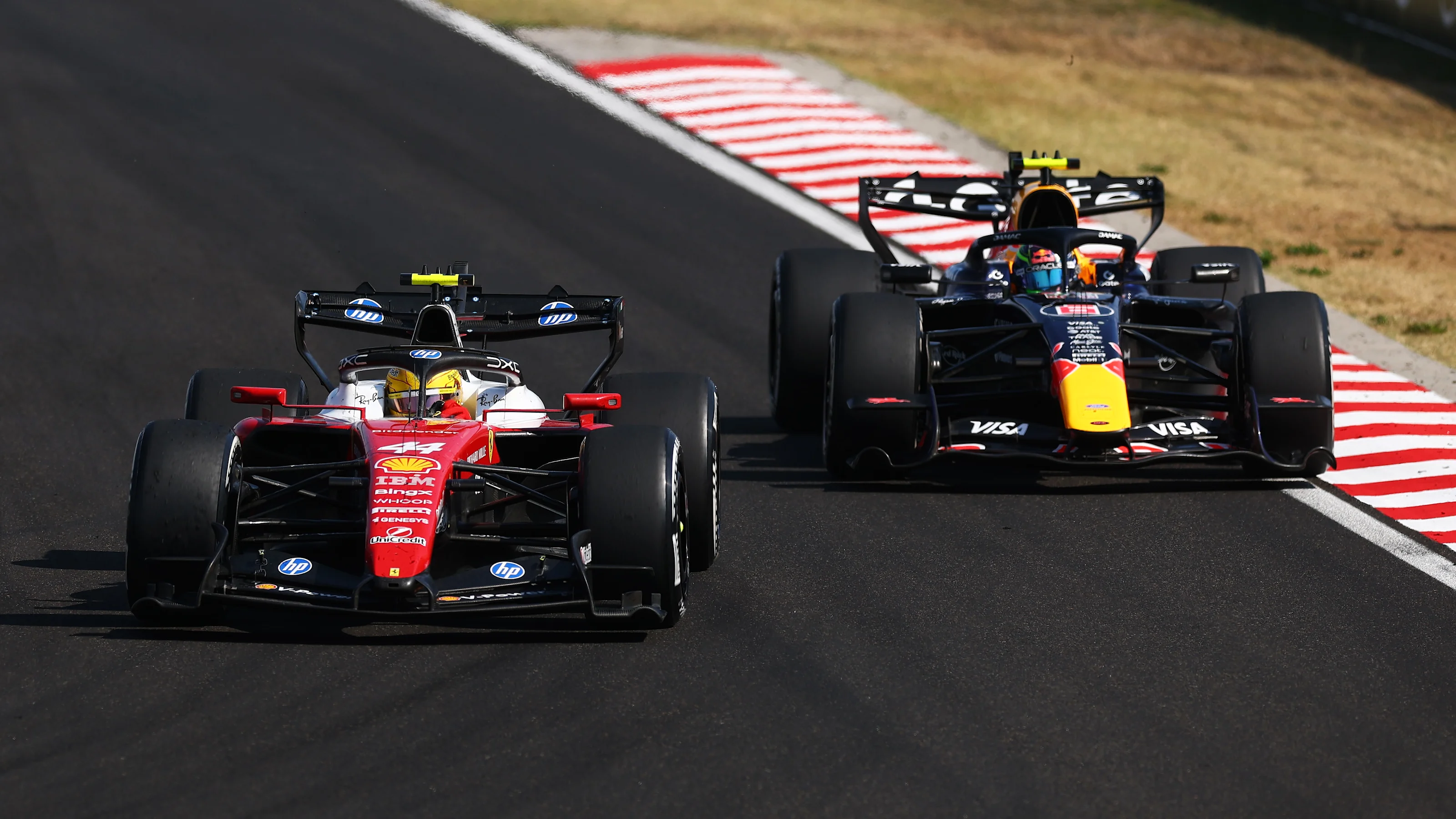 BUDAPEST, HUNGARY - JULY 26: Lewis Hamilton of Great Britain driving the (44) Scuderia Ferrari