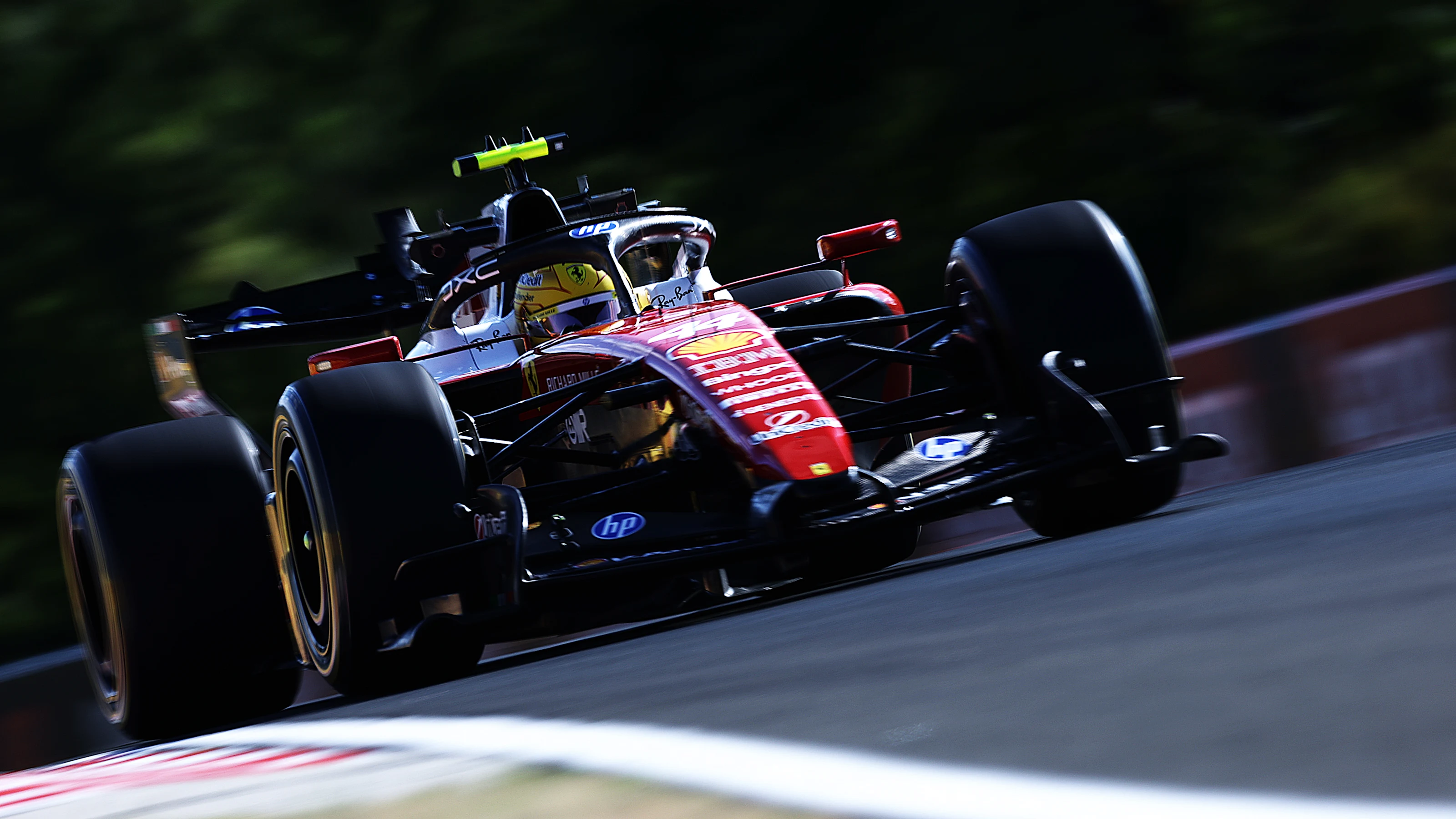 BUDAPEST, HUNGARY - JULY 24: Lewis Hamilton of Great Britain driving the (44) Scuderia Ferrari