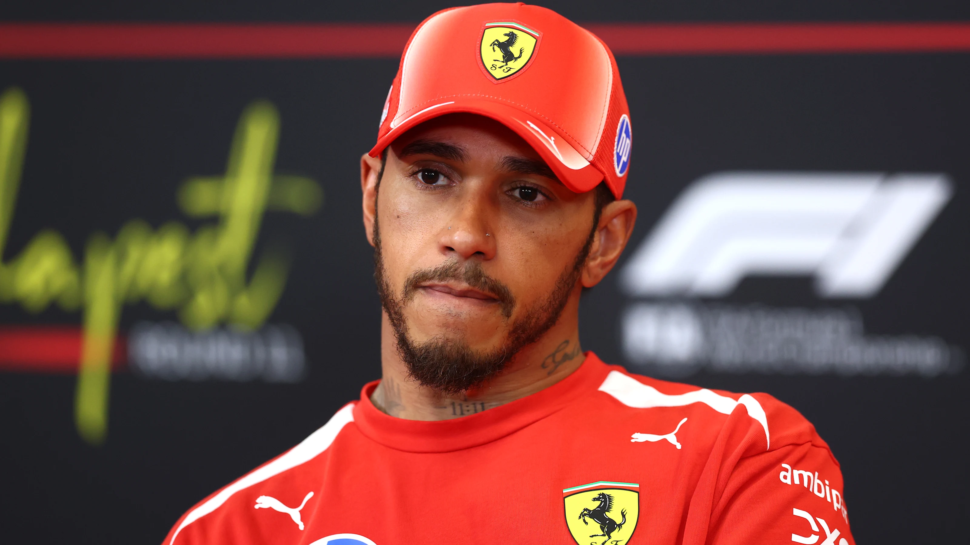 BUDAPEST, HUNGARY - JULY 25: Second placed qualifier Lewis Hamilton of Great Britain and Scuderia
