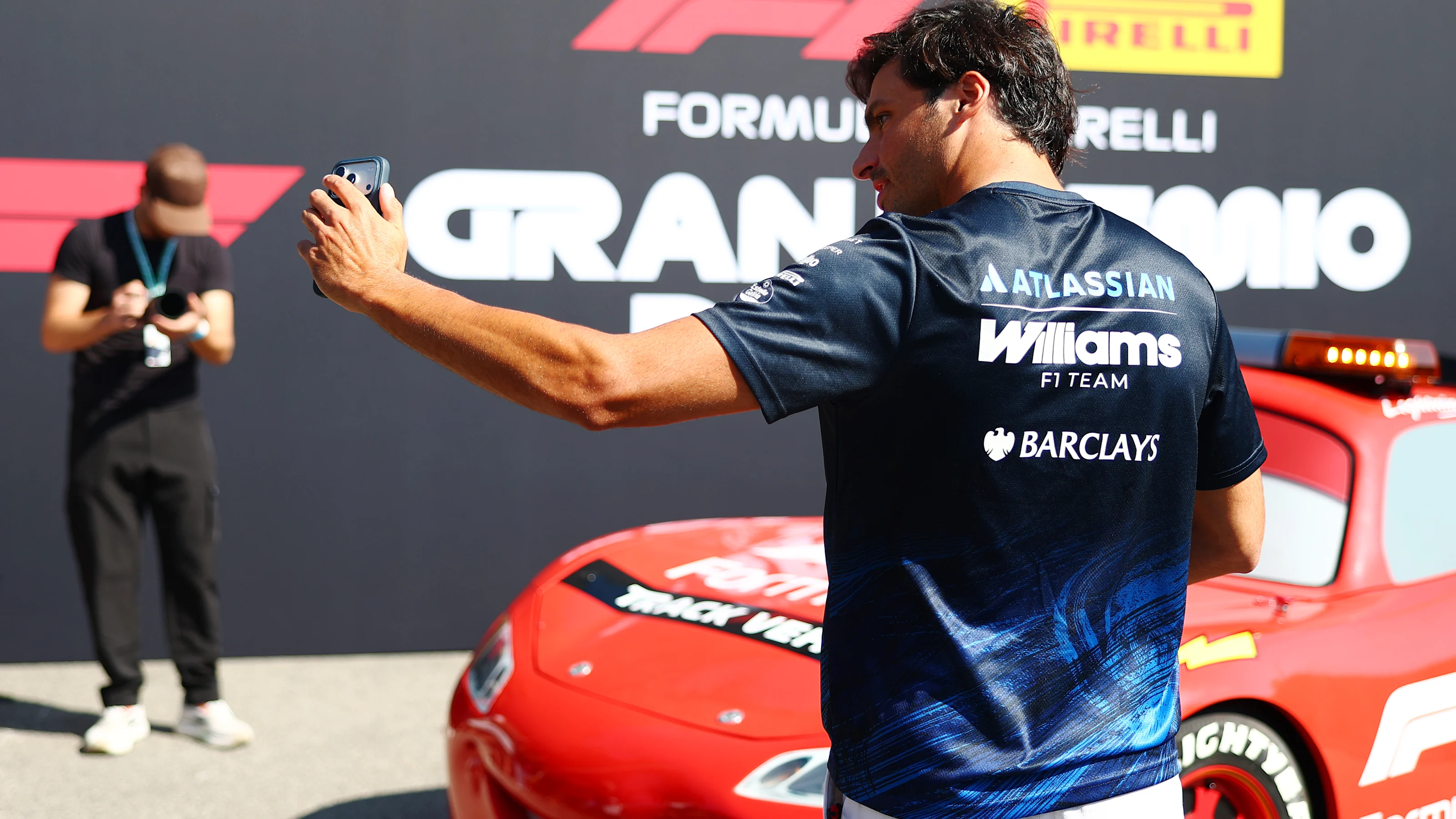 MONZA, ITALY - SEPTEMBER 03: Carlos Sainz of Spain and Williams takes a selfie with a Lightning
