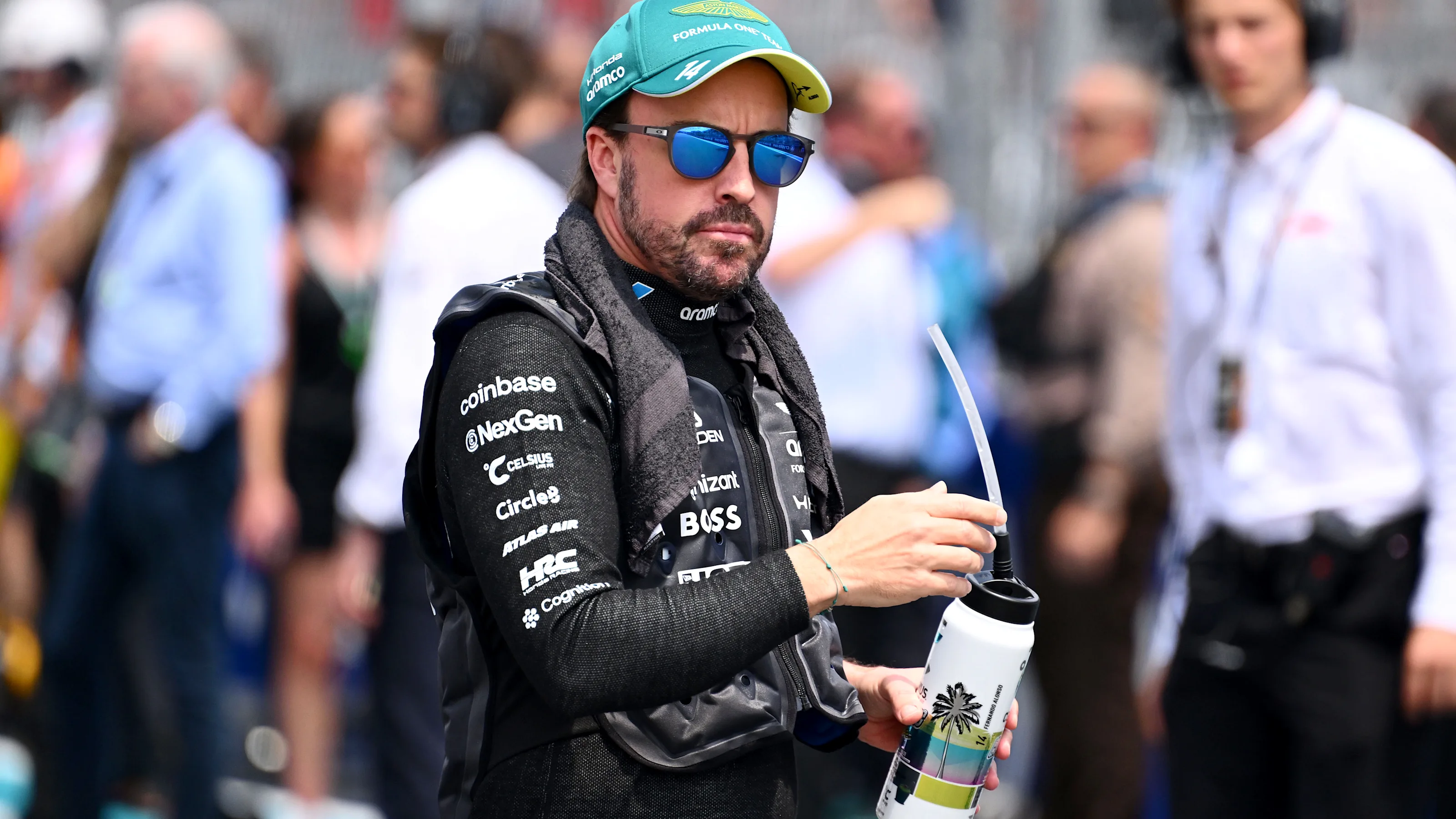 MIAMI, FLORIDA - MAY 02: Fernando Alonso of Spain and Aston Martin F1 Team looks on on the grid