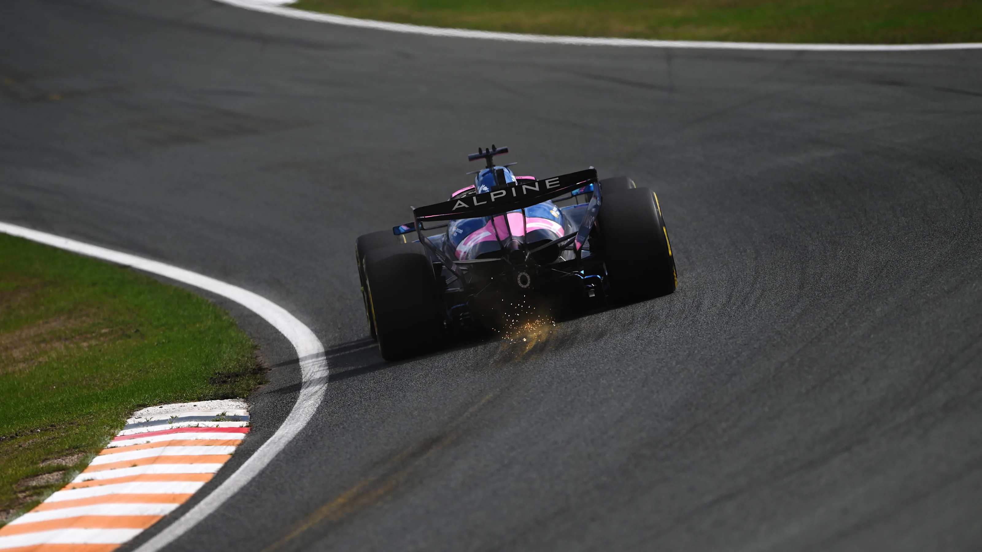 ZANDVOORT, NETHERLANDS - AUGUST 22: Sparks fly behind Pierre Gasly of France driving the (10)