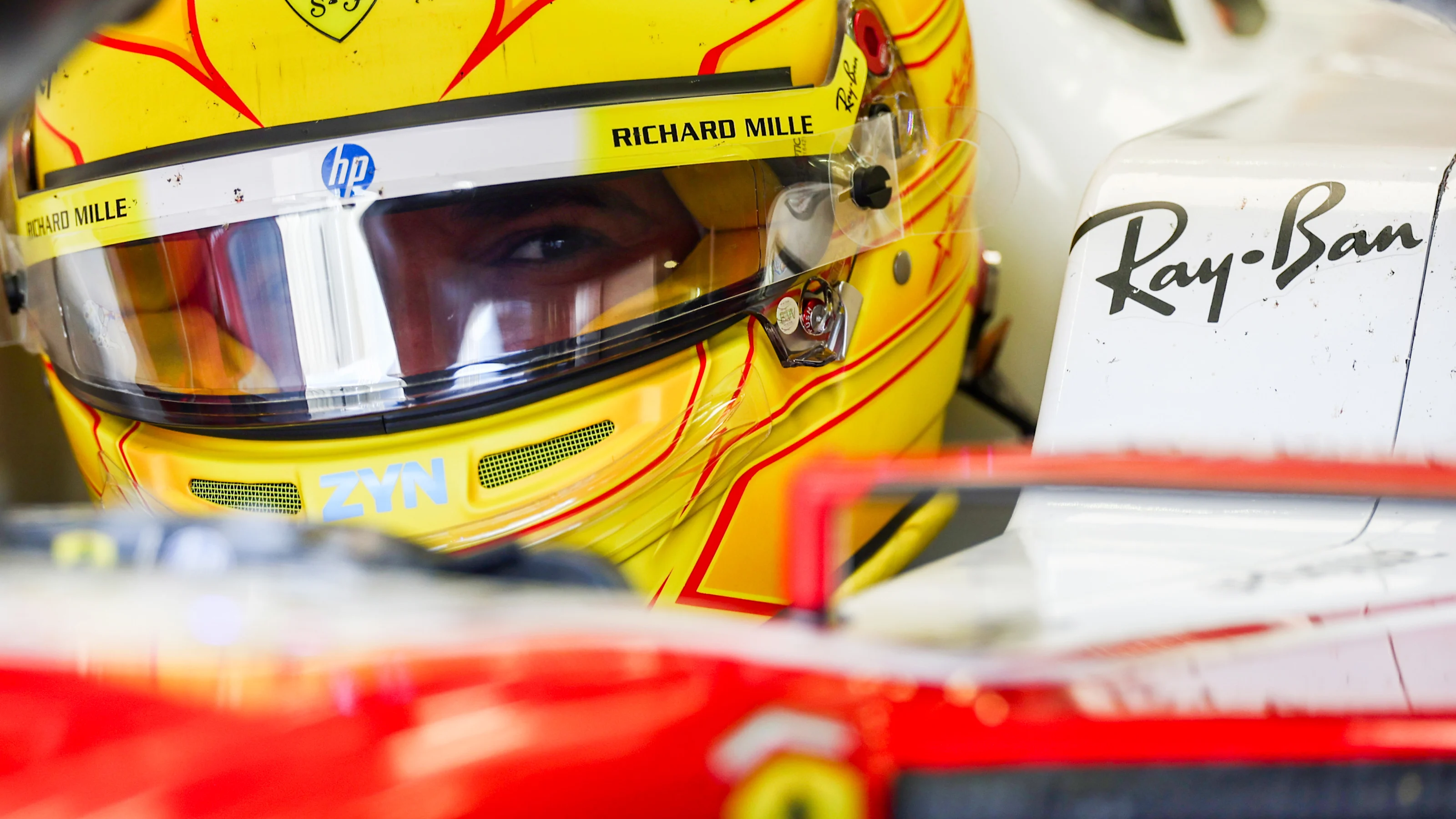 BAHRAIN, BAHRAIN - FEBRUARY 13: Lewis Hamilton of Great Britain and Scuderia Ferrari prepares to