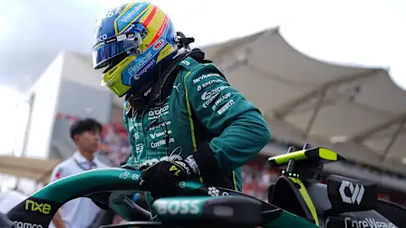 AUSTIN, TEXAS - OCTOBER 25: Fernando Alonso of Spain and Aston Martin F1 Team on the grid prior to