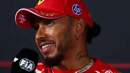 MONZA, ITALY - SEPTEMBER 03: Lewis Hamilton of Great Britain and Scuderia Ferrari speaks in the