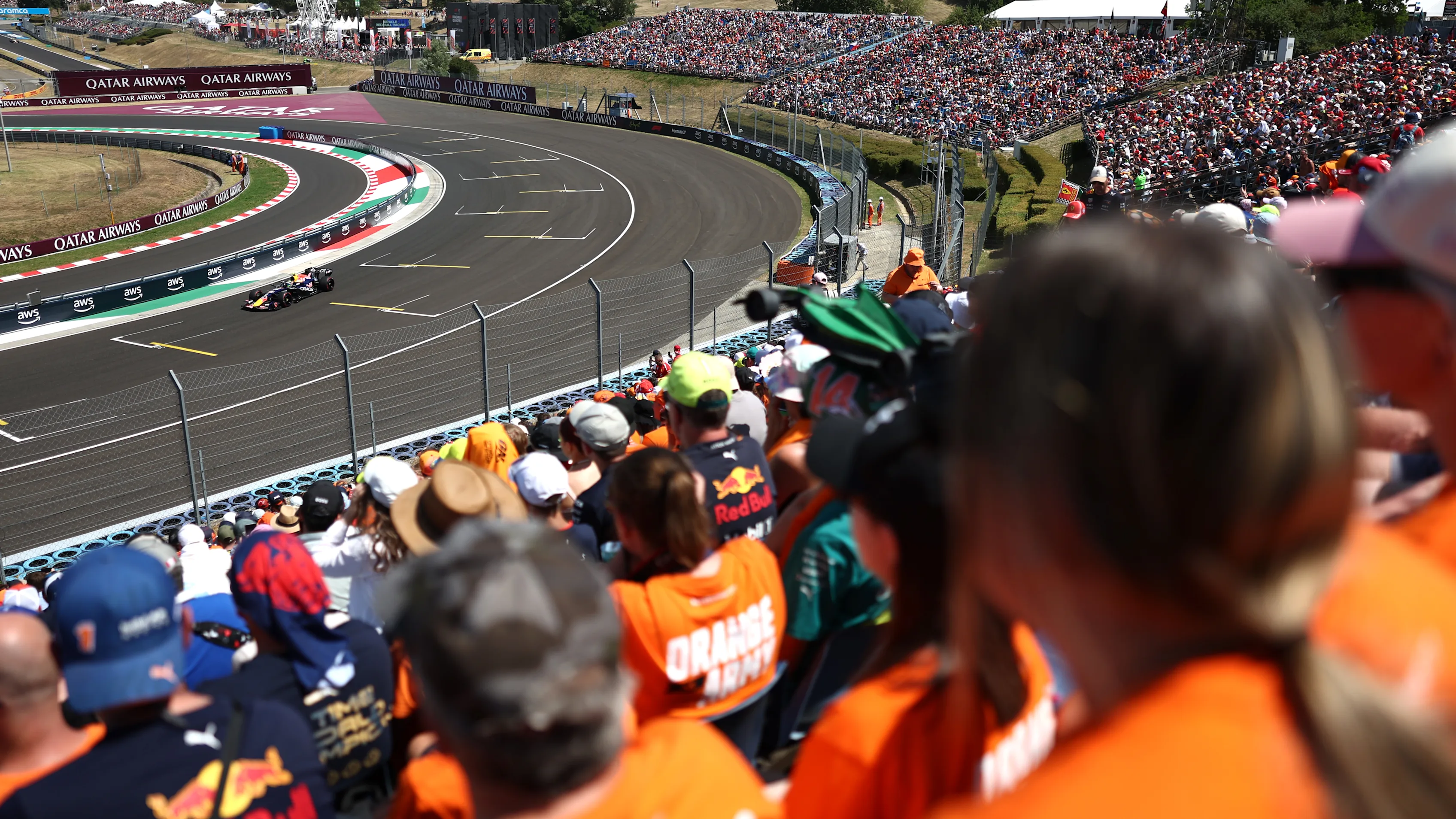 Formula 1 car running at the Hungaroring in front of a packed crowd during the 2026 Hungarian Grand Prix weekend