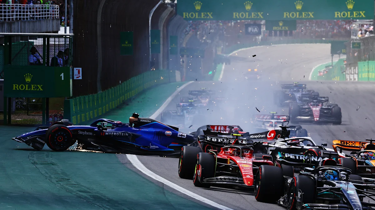 Williams, Haas and Ferrari cars caught in opening-lap chaos at Interlagos.