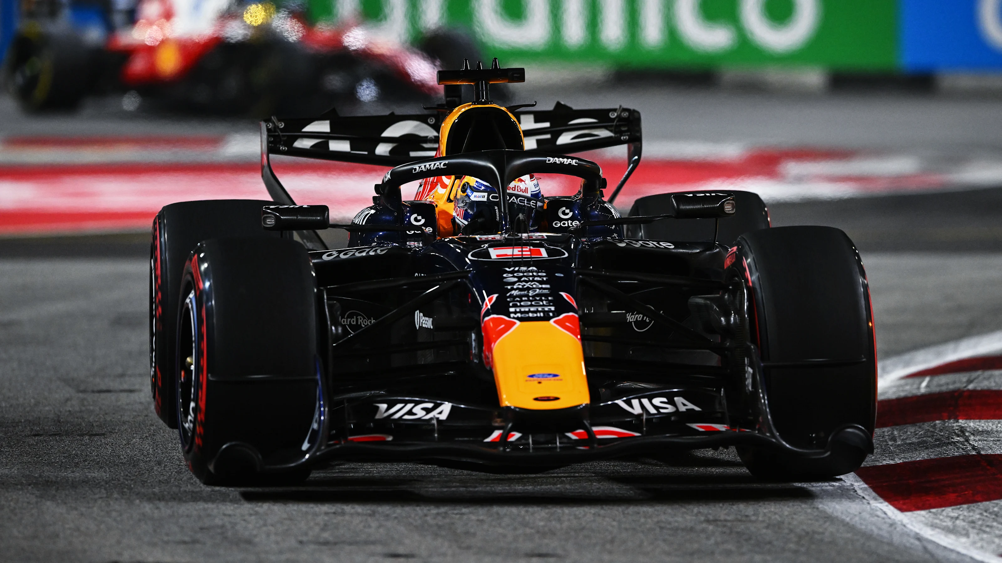 SINGAPORE, SINGAPORE - OCTOBER 11: Max Verstappen of the Netherlands driving the (3) Oracle Red