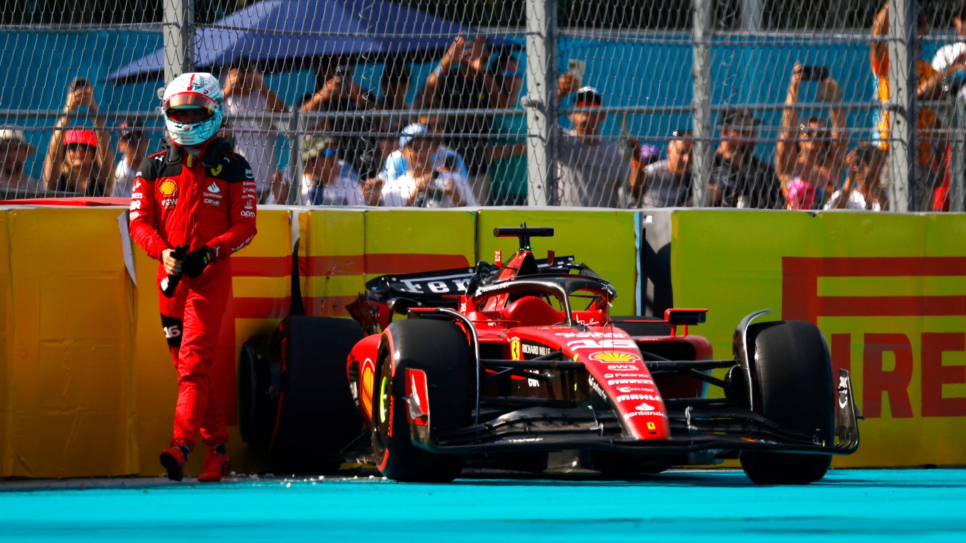 MIAMI, FLORIDA - MAY 06: Charles Leclerc of Monaco and Ferrari walks from his car after crashing