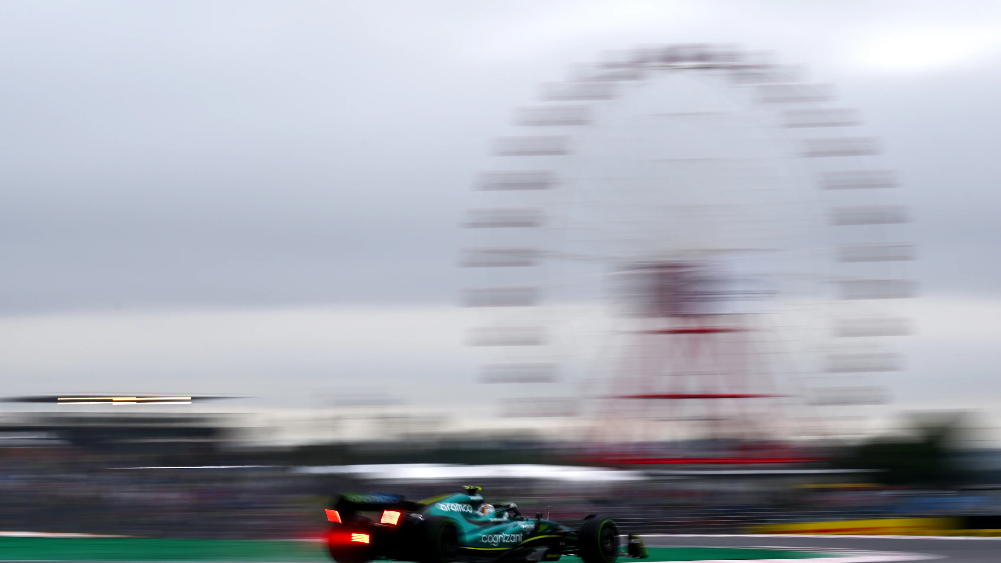 SUZUKA, JAPAN - OCTOBER 07: Sebastian Vettel of Germany driving the (5) Aston Martin AMR22 Mercedes
