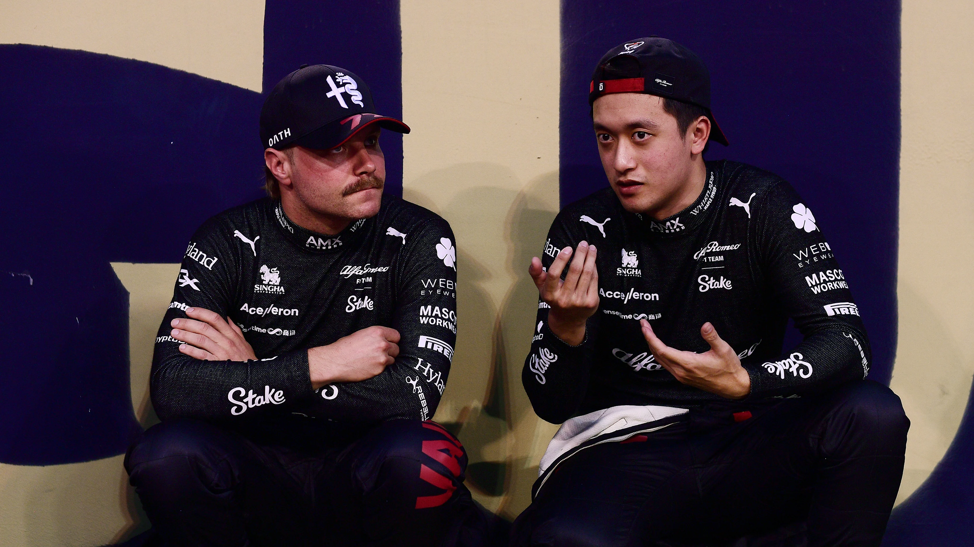 BAHRAIN, BAHRAIN - MARCH 05: Valtteri Bottas of Finland and Alfa Romeo F1 and Zhou Guanyu of China