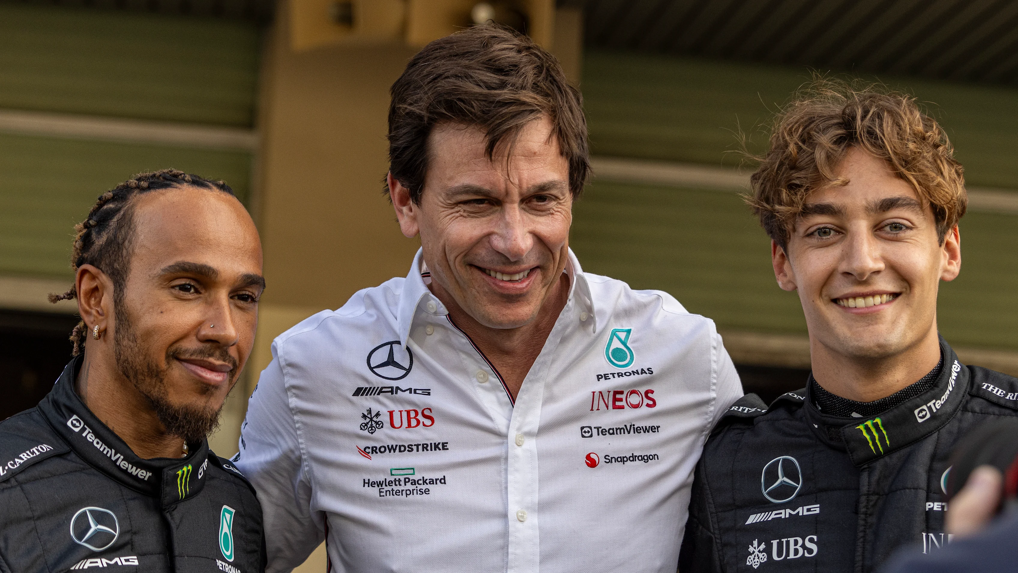 ABU DHABI, UNITED ARAB EMIRATES - NOVEMBER 23: Lewis Hamilton of Great Britain and Mercedes (L),