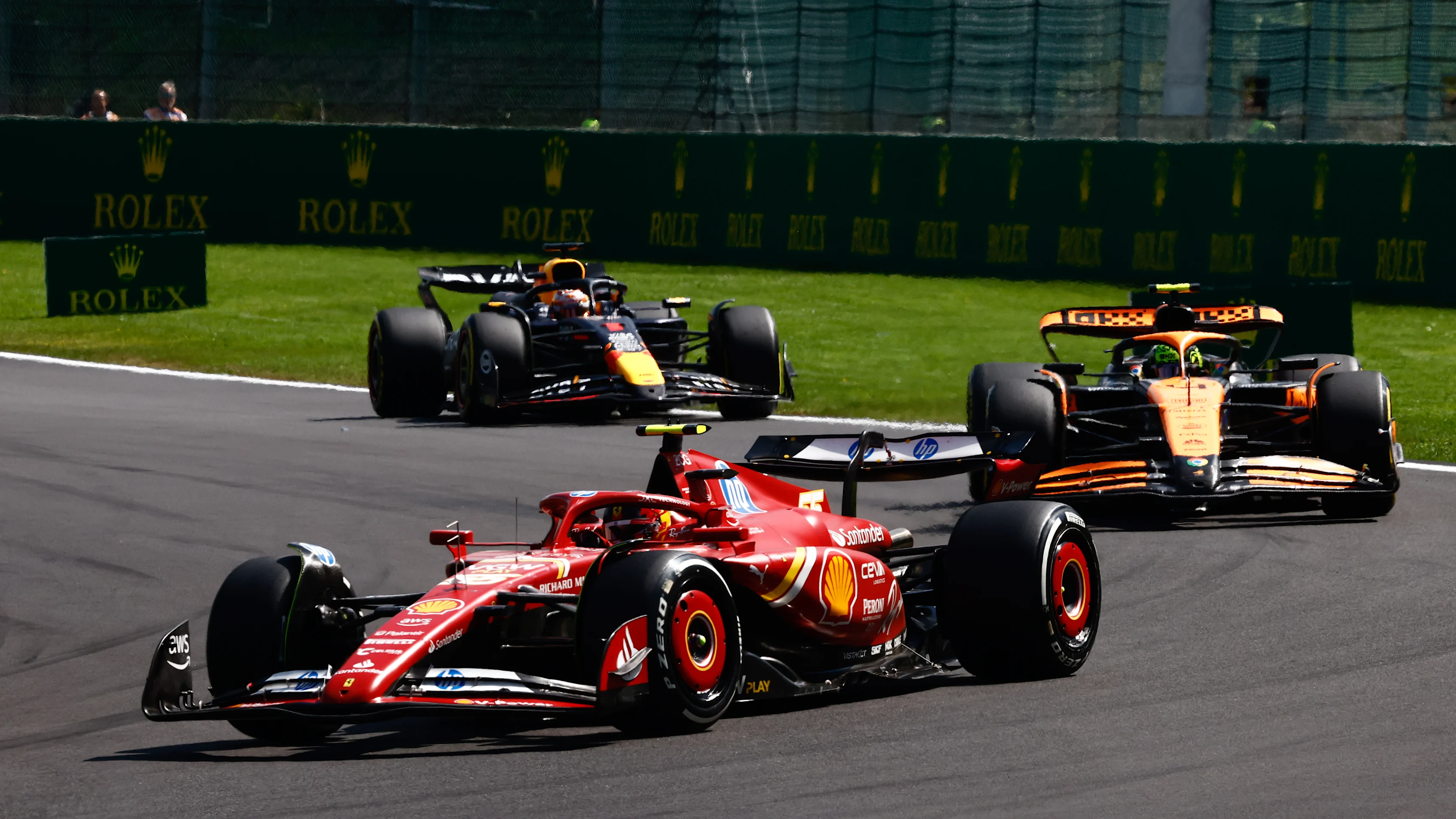 Carlos Sainz of Ferrari, Lando Norris of McLaren and Max Verstappen of Red Bull Racing during the