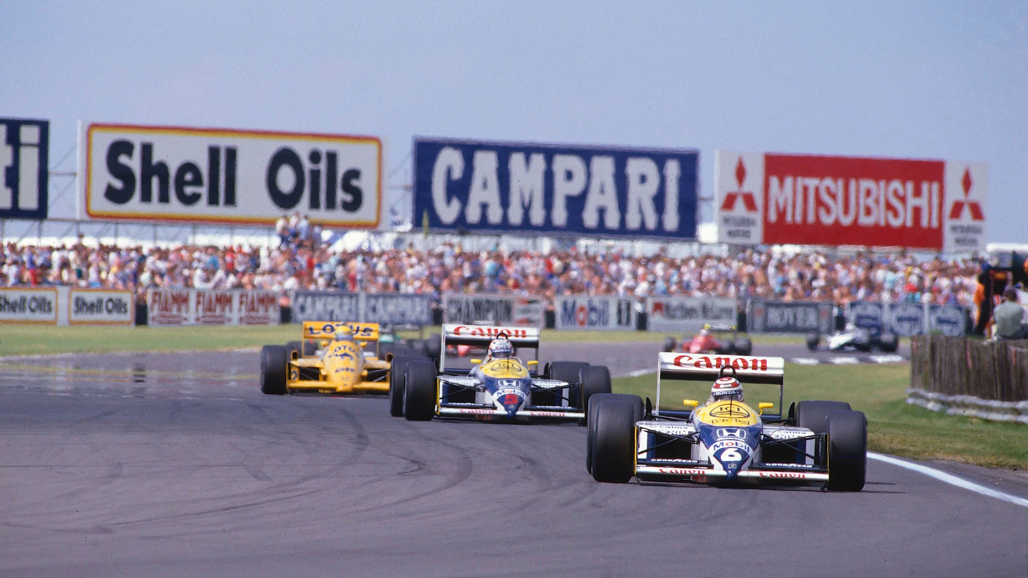 1987 British Grand Prix. Silverstone, England. 10-12 July 1987. Nelson Piquet leads Nigel Mansell