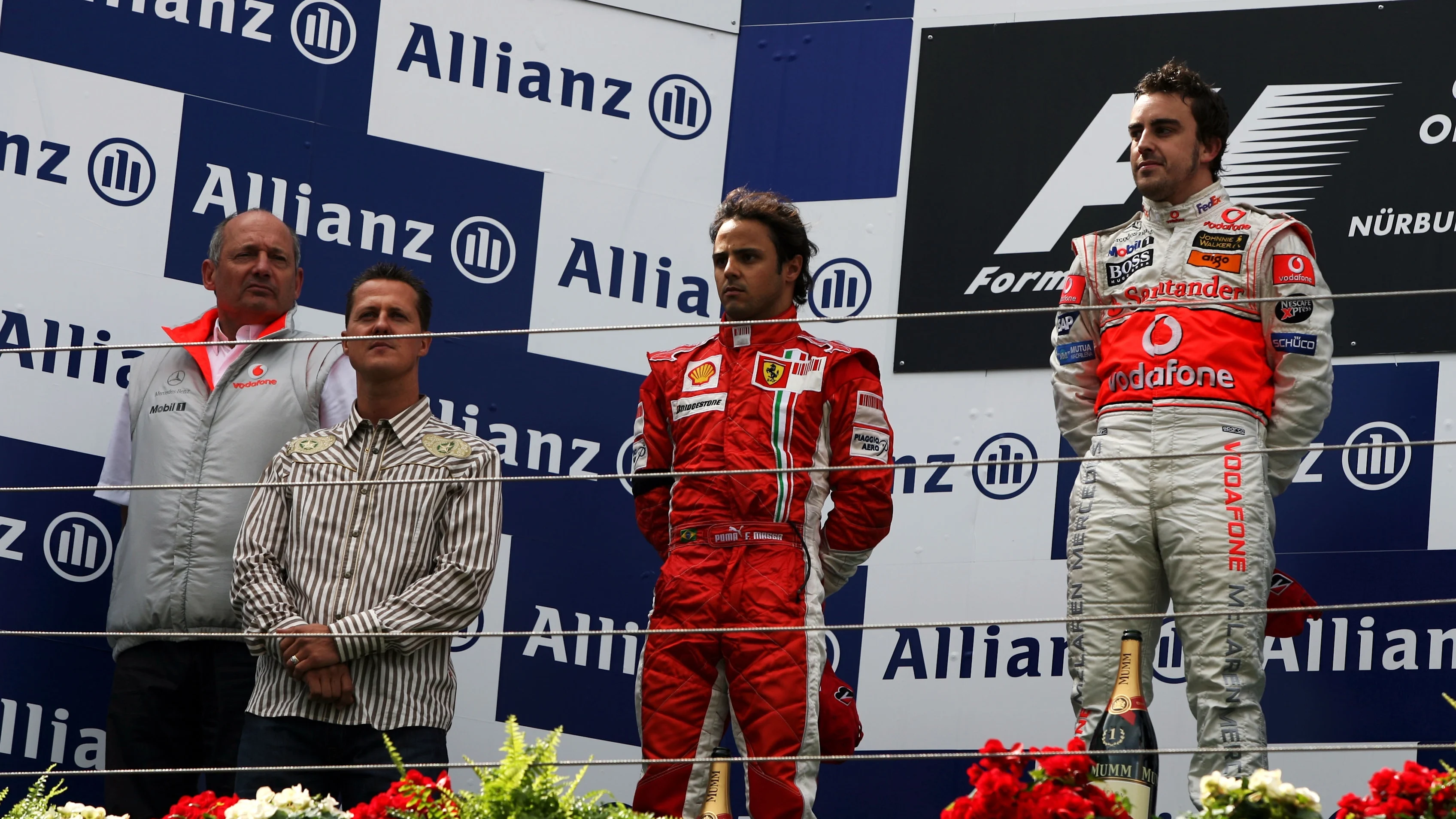 The podium (L to R): Ron Dennis (GBR) McLaren Team Principal; Michael Schumacher (GER) Ferrari;