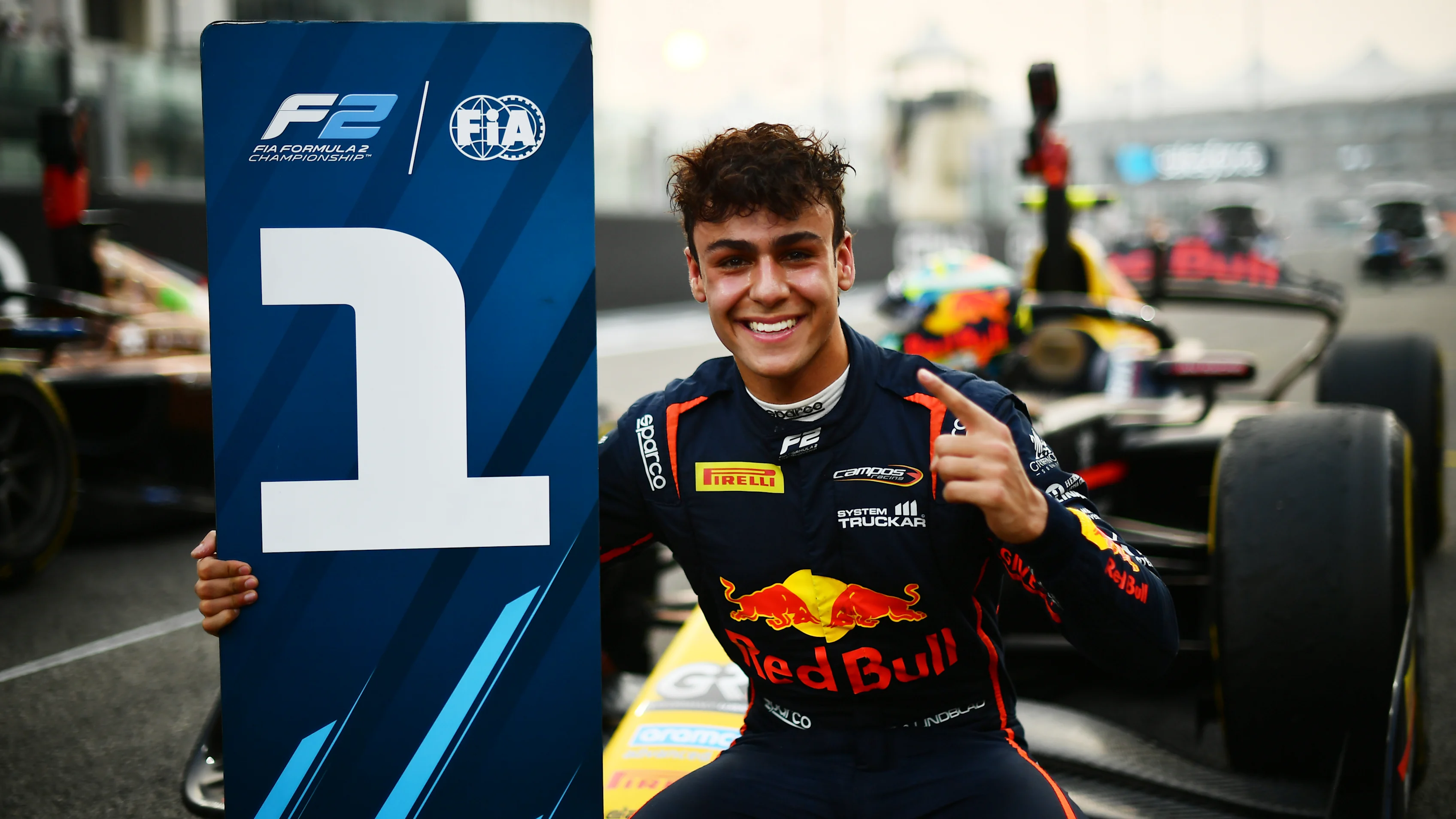 ABU DHABI, UNITED ARAB EMIRATES - DECEMBER 06: Race winner Arvid Lindblad of Great Britain and