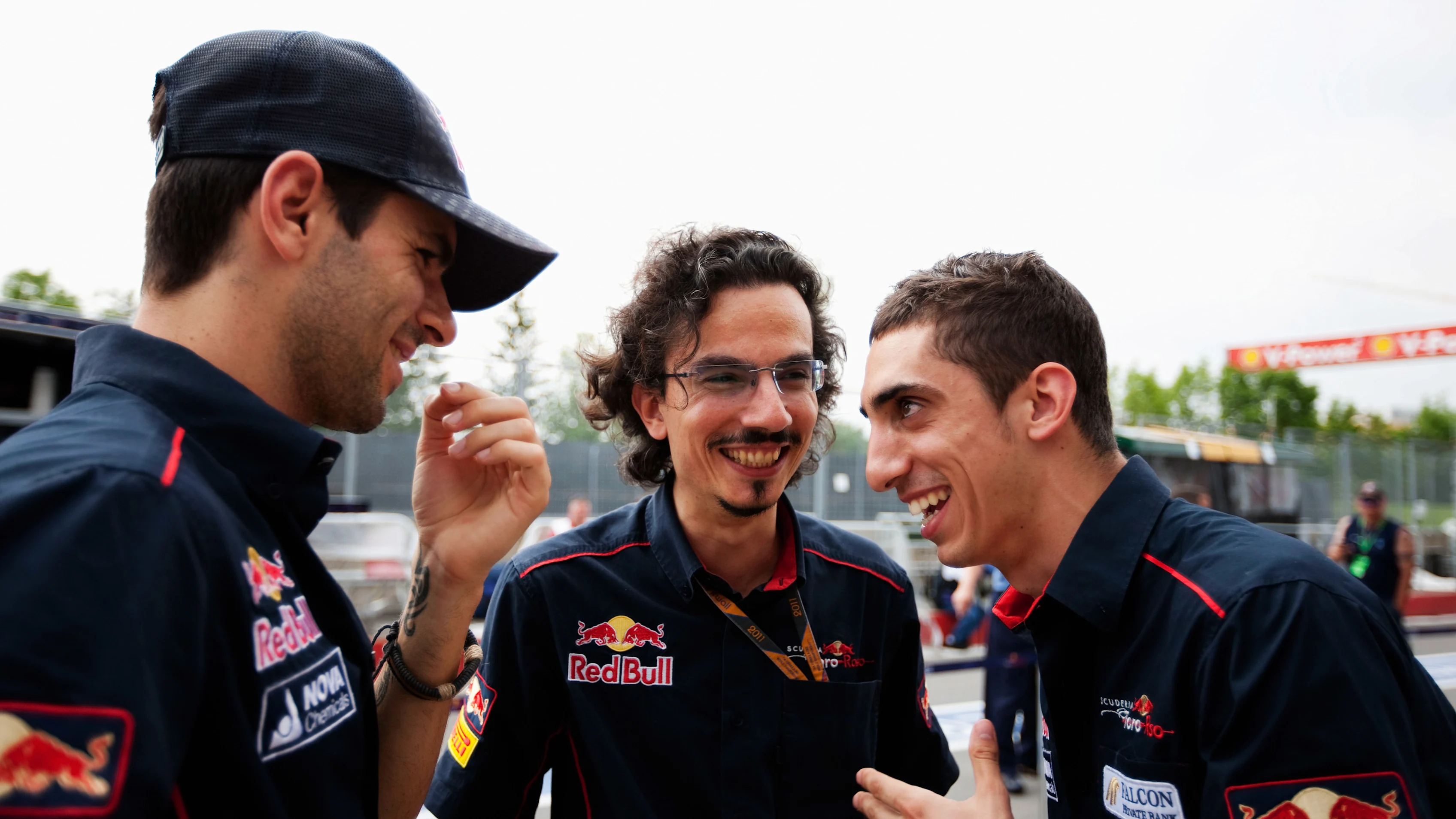 MONTREAL, CANADA - JUNE 09: Sebastien Buemi (R) of Switzerland and Scuderia Toro Rosso jokes with