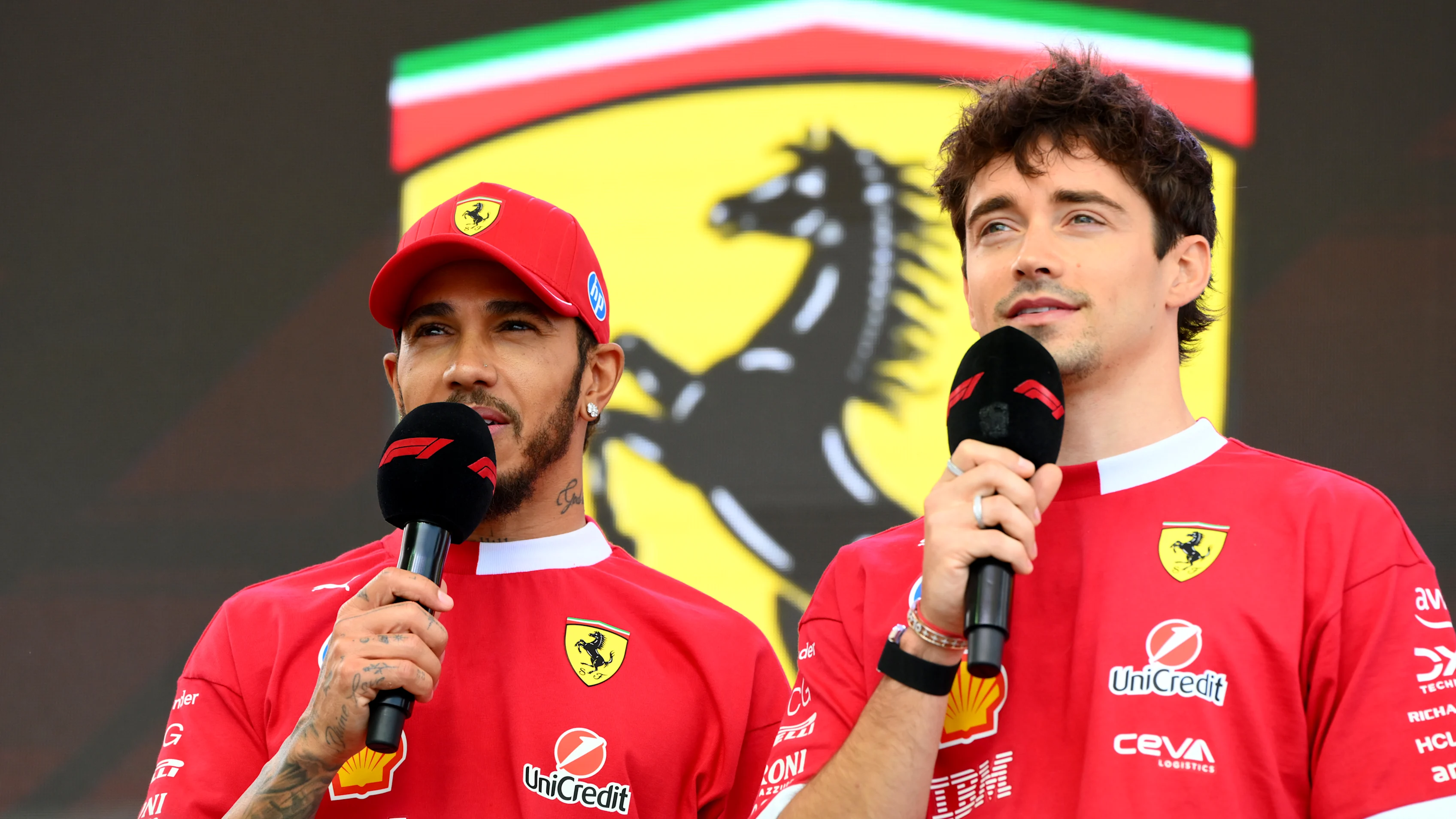 BUDAPEST, HUNGARY - AUGUST 02: Lewis Hamilton of Great Britain and Scuderia Ferrari and Charles