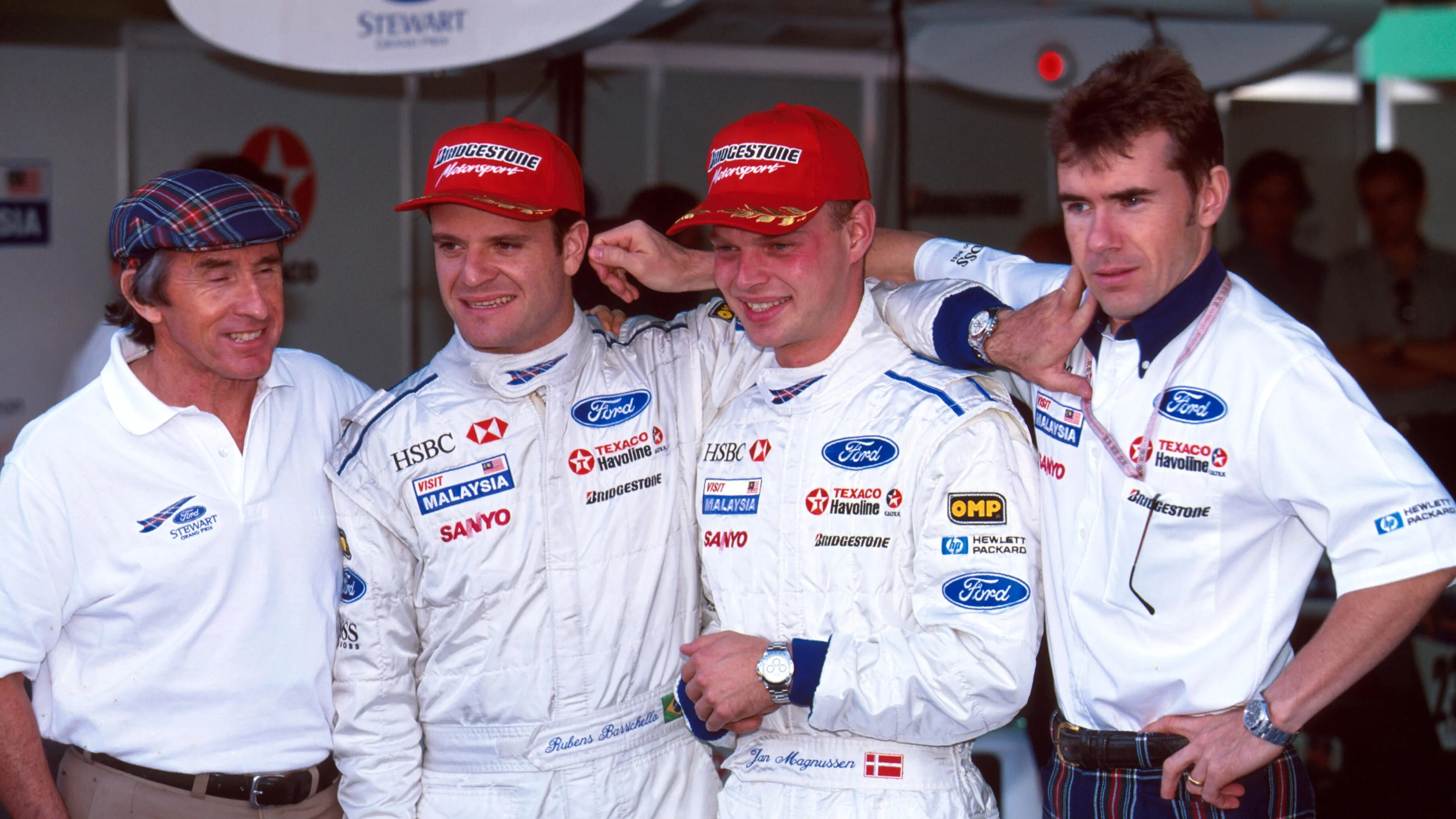 L to R: Jackie Stewart, Rubens Barrichello, Jan Magnussen, and Paul Stewart Japanese Grand Prix,