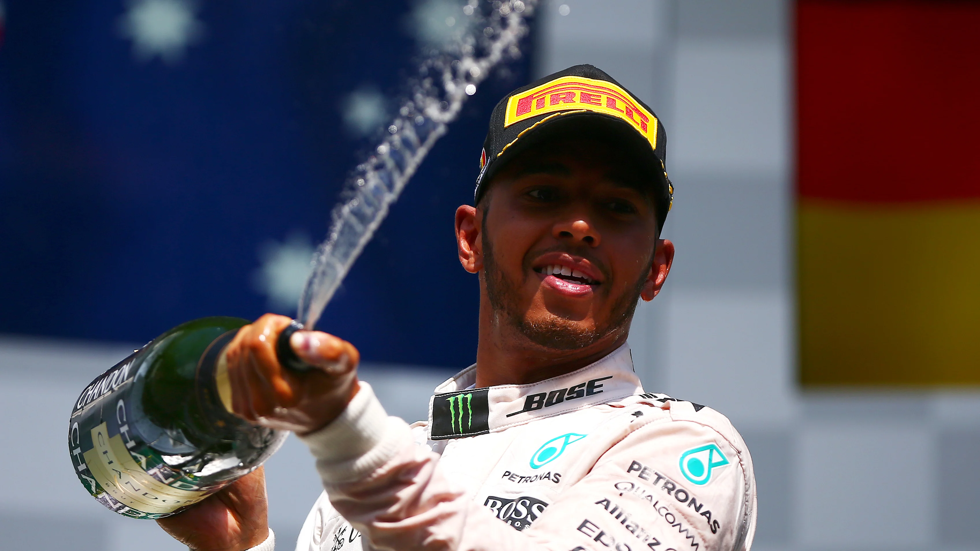 SPA, BELGIUM - AUGUST 28: Lewis Hamilton of Great Britain and Mercedes GP celebrates on the podium