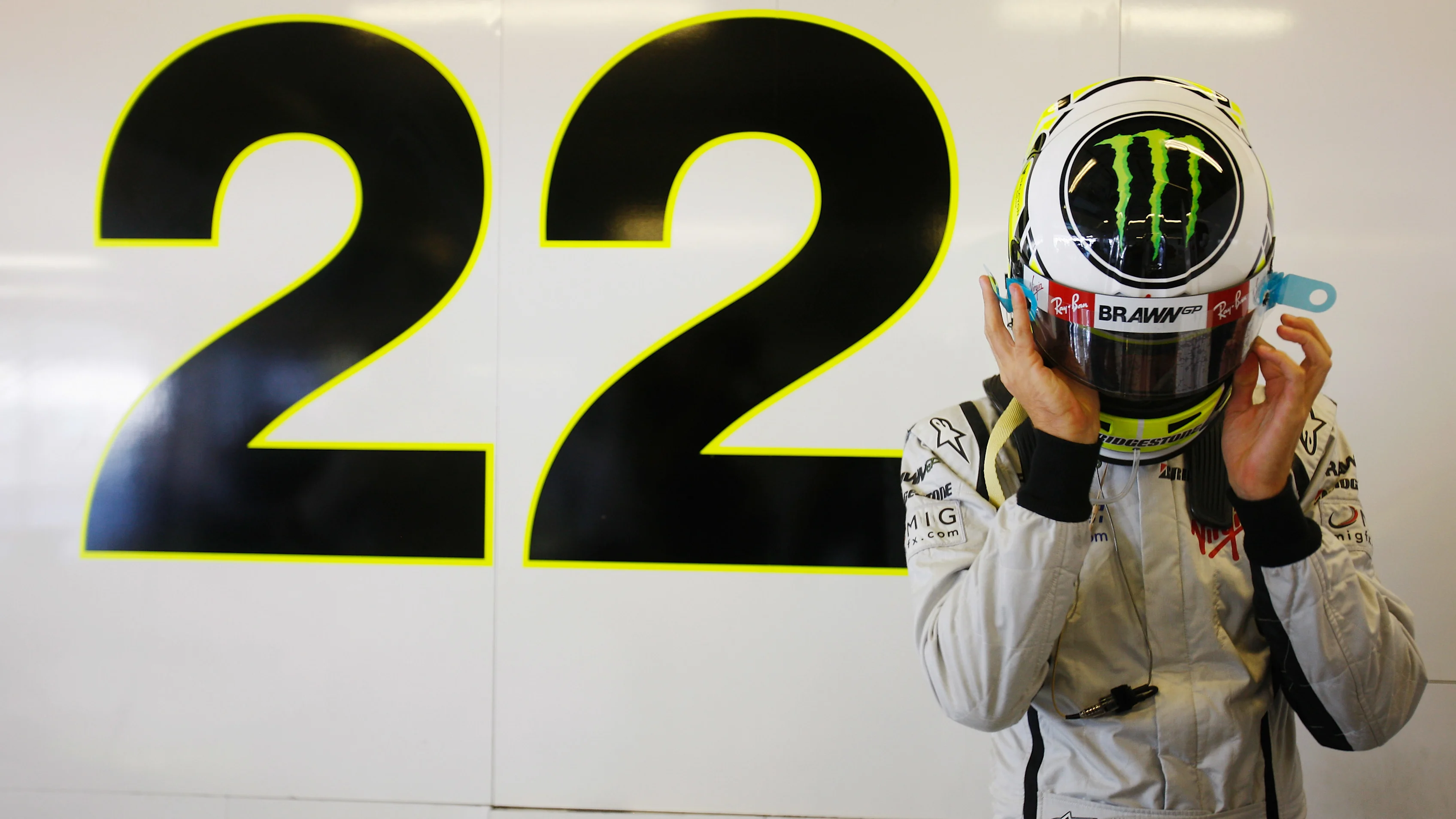 ABU DHABI, UNITED ARAB EMIRATES - OCTOBER 30: Jenson Button of Great Britain and Brawn GP prepares