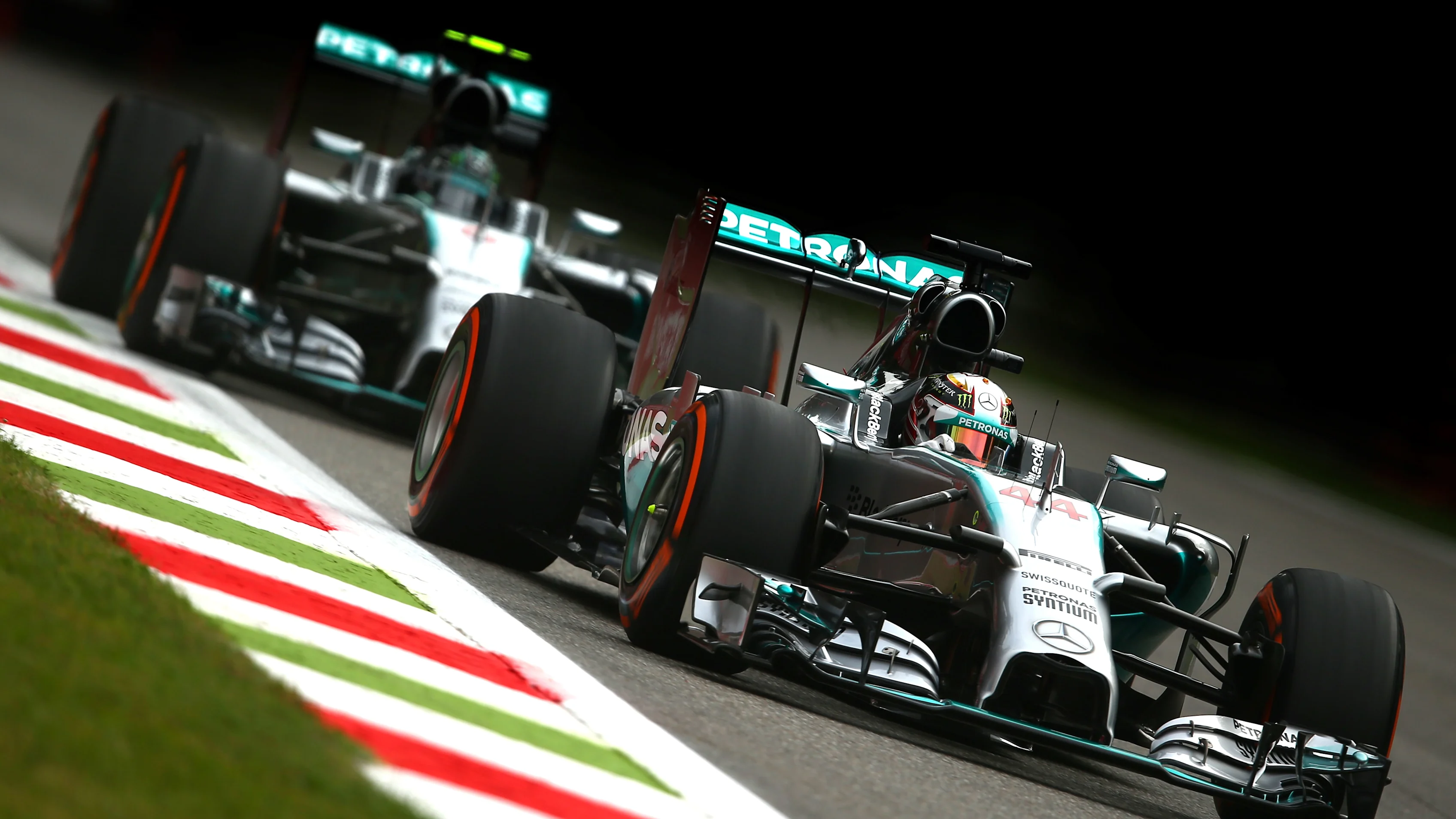 MONZA, ITALY - SEPTEMBER 05:  (R-L) Lewis Hamilton of Great Britain and Mercedes GP and Nico