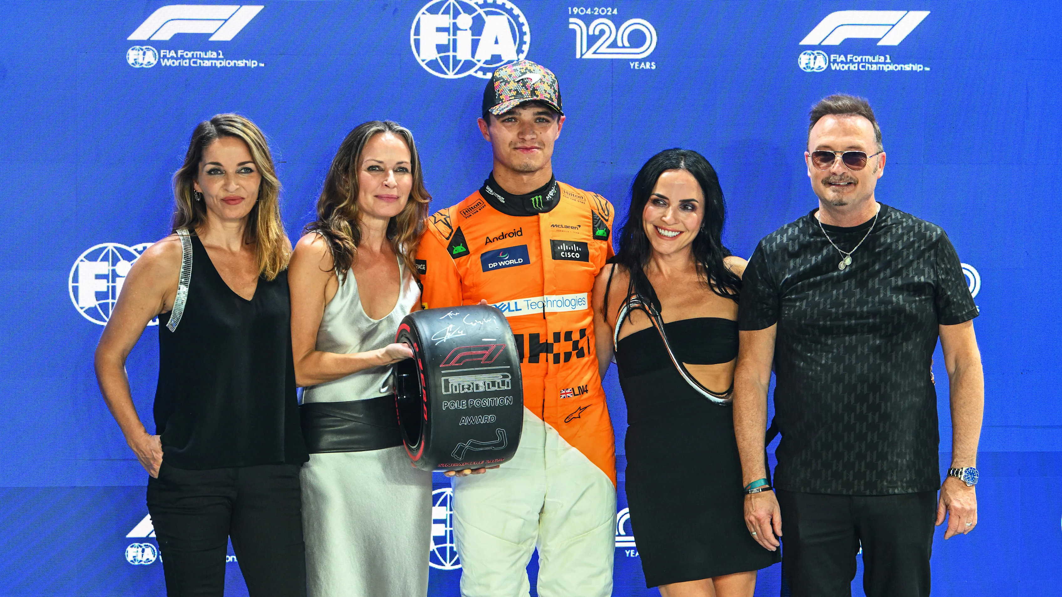 MARINA BAY STREET CIRCUIT, SINGAPORE - SEPTEMBER 21: Pole man Lando Norris, McLaren F1 Team,