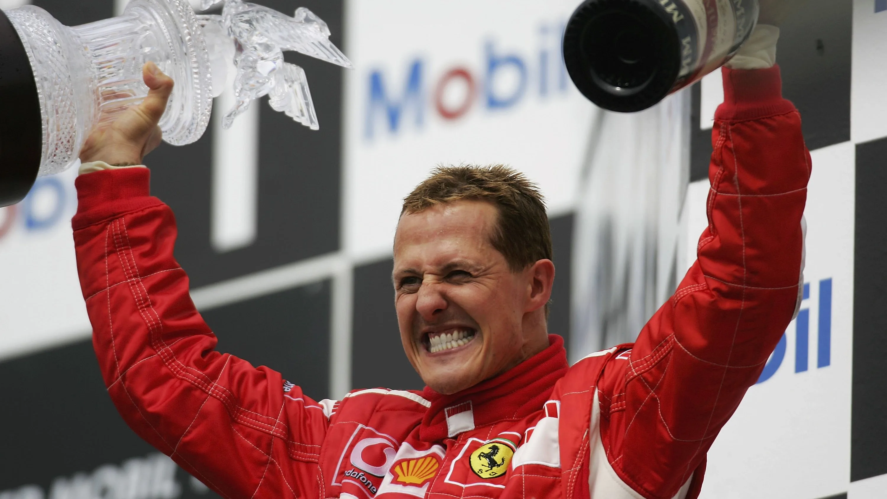 HOCKENHEIM, GERMANY - JULY 30: Michael Schumacher of Germany and Ferrari celebrates on the podium