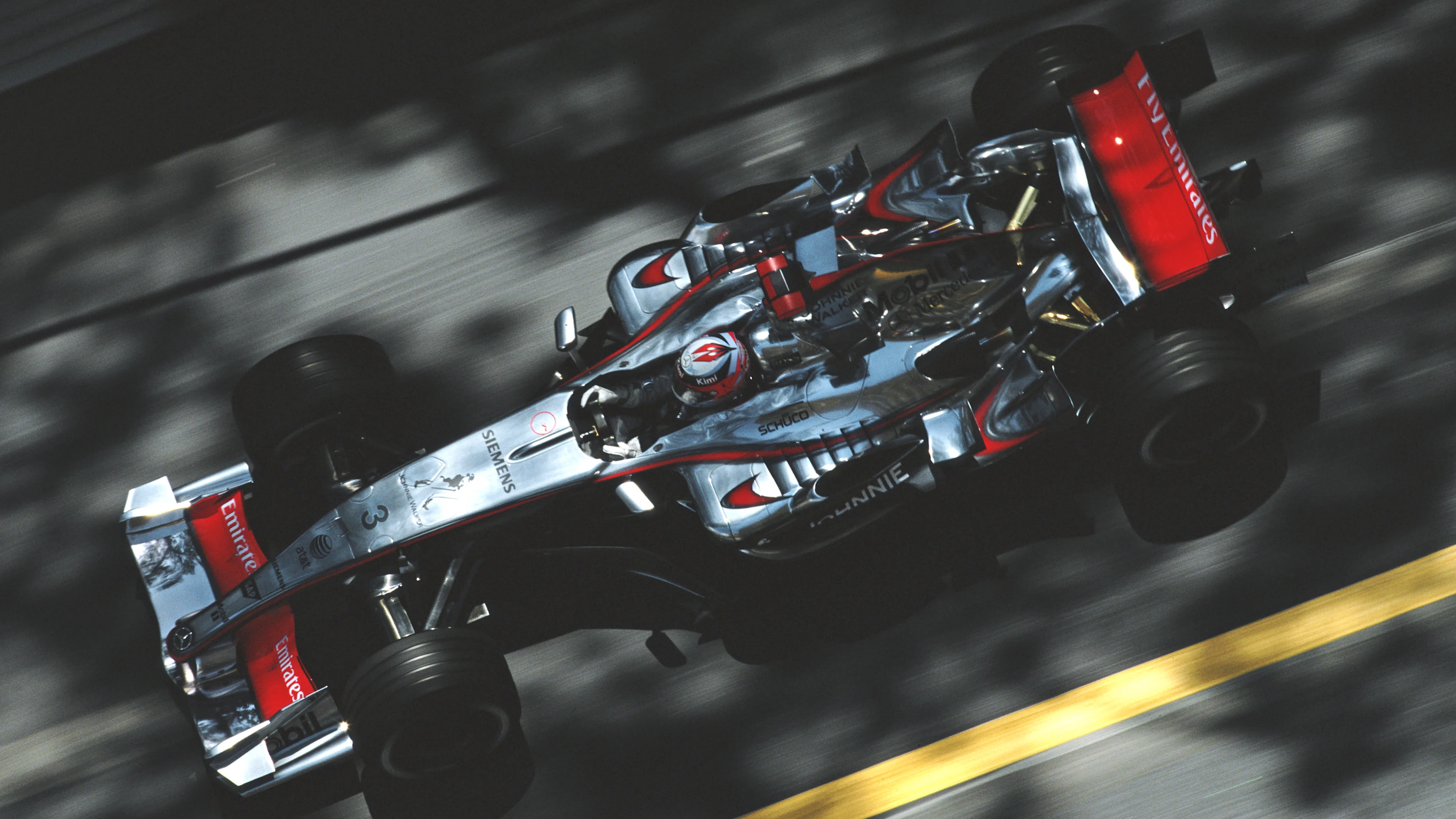 Kimi Raikkonen of Finland drives the #3 Team McLaren Mercedes McLaren MP4-21 Mercedes V8 during